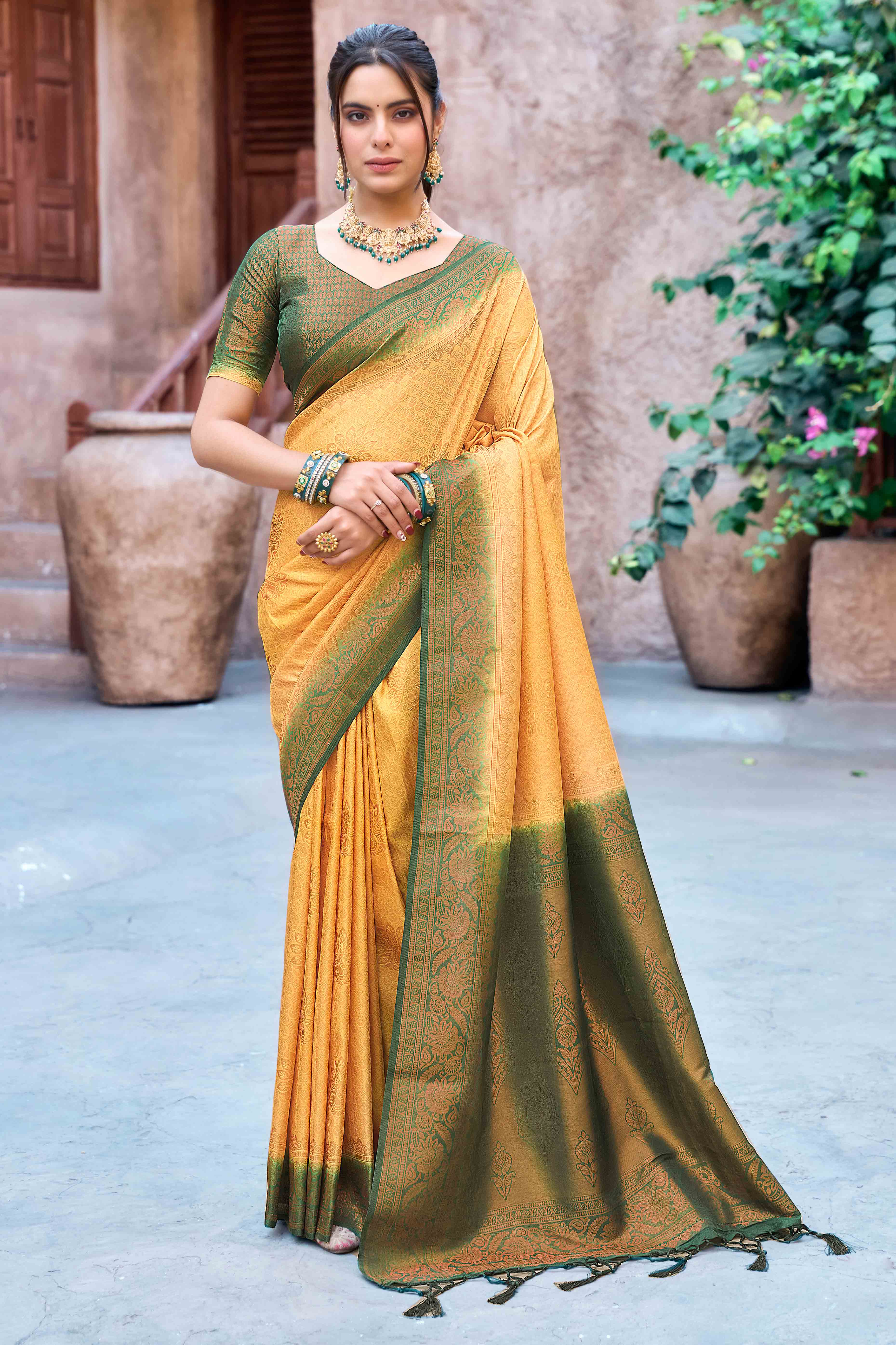 Mustard Banarasi Silk Saree Featuring Elegant Floral Woven & Delicate Tassel Edging