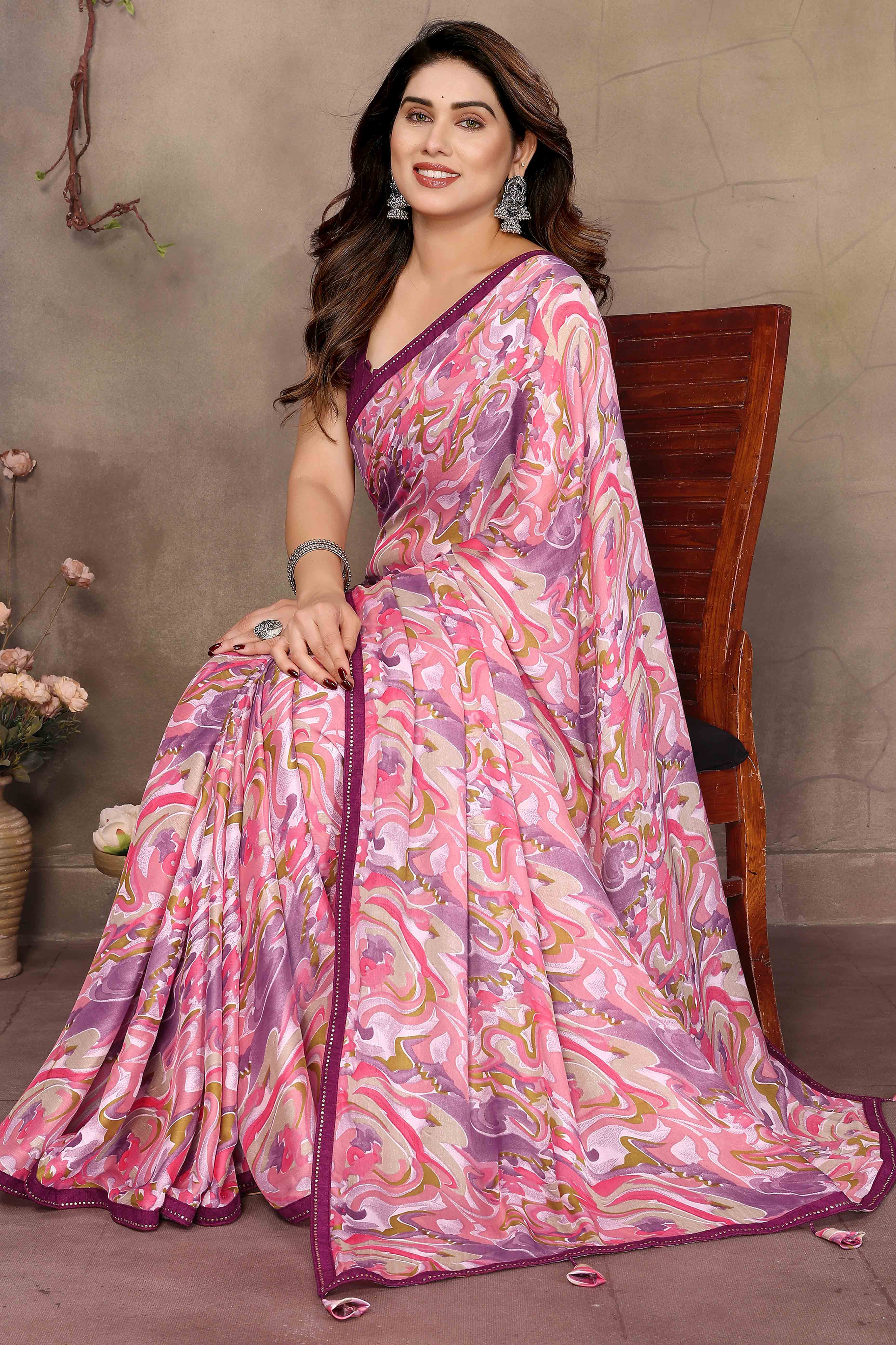 Pink Chiffon Party Saree with Vibrant Floral Patterns and Graceful Drape