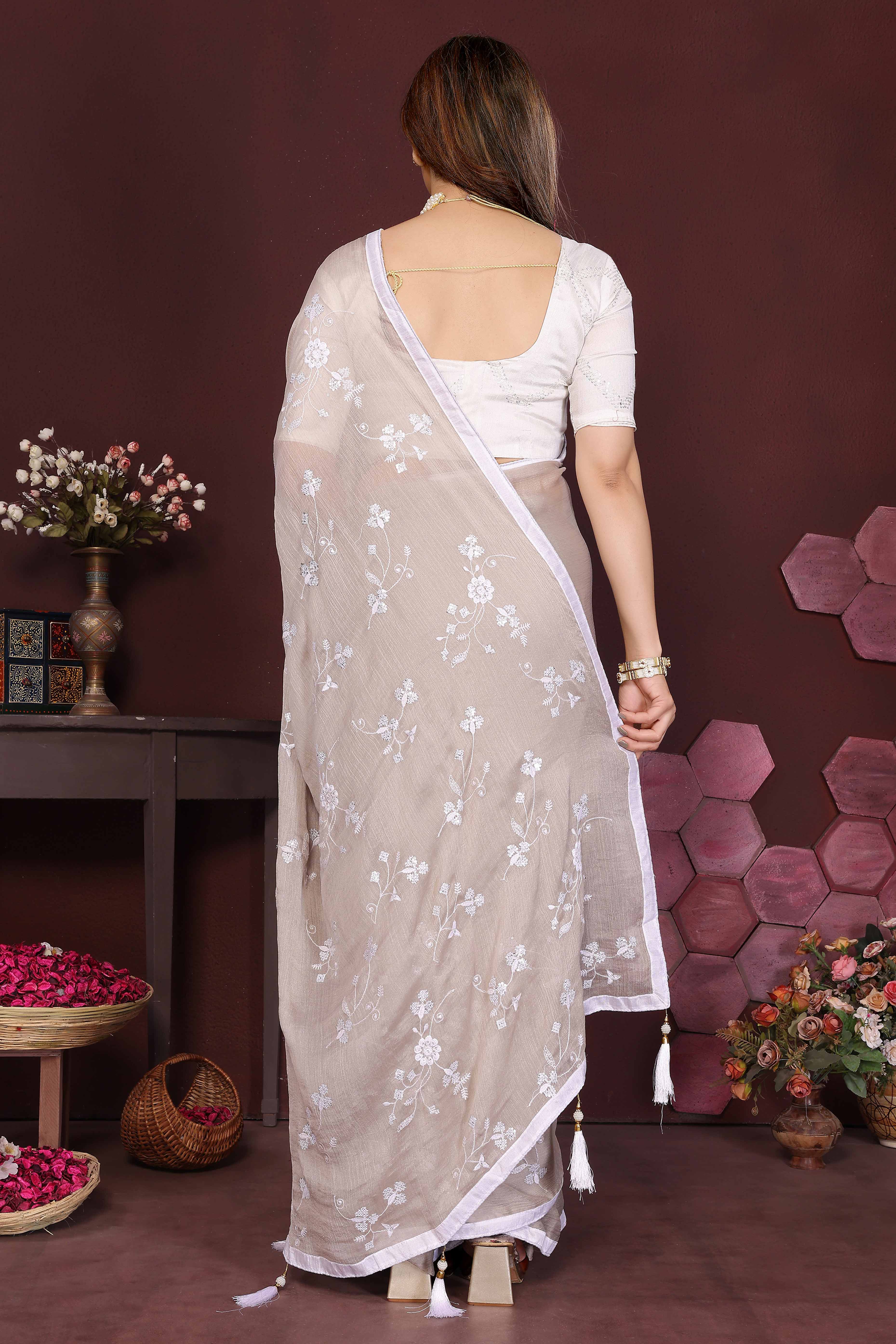 Beige Bloom Saree adorned with Moss Floral Embroidery and Delicate Lace Border