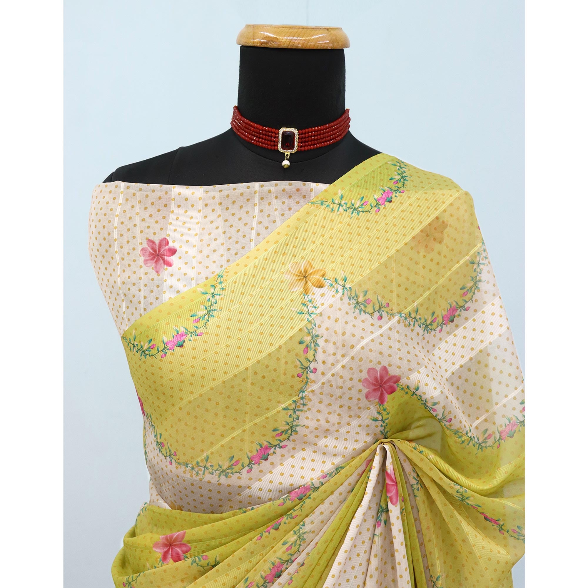 Lemon Yellow Bloom Floral Digital Printed Georgette Saree Accentuated With Graceful Zari Stripes