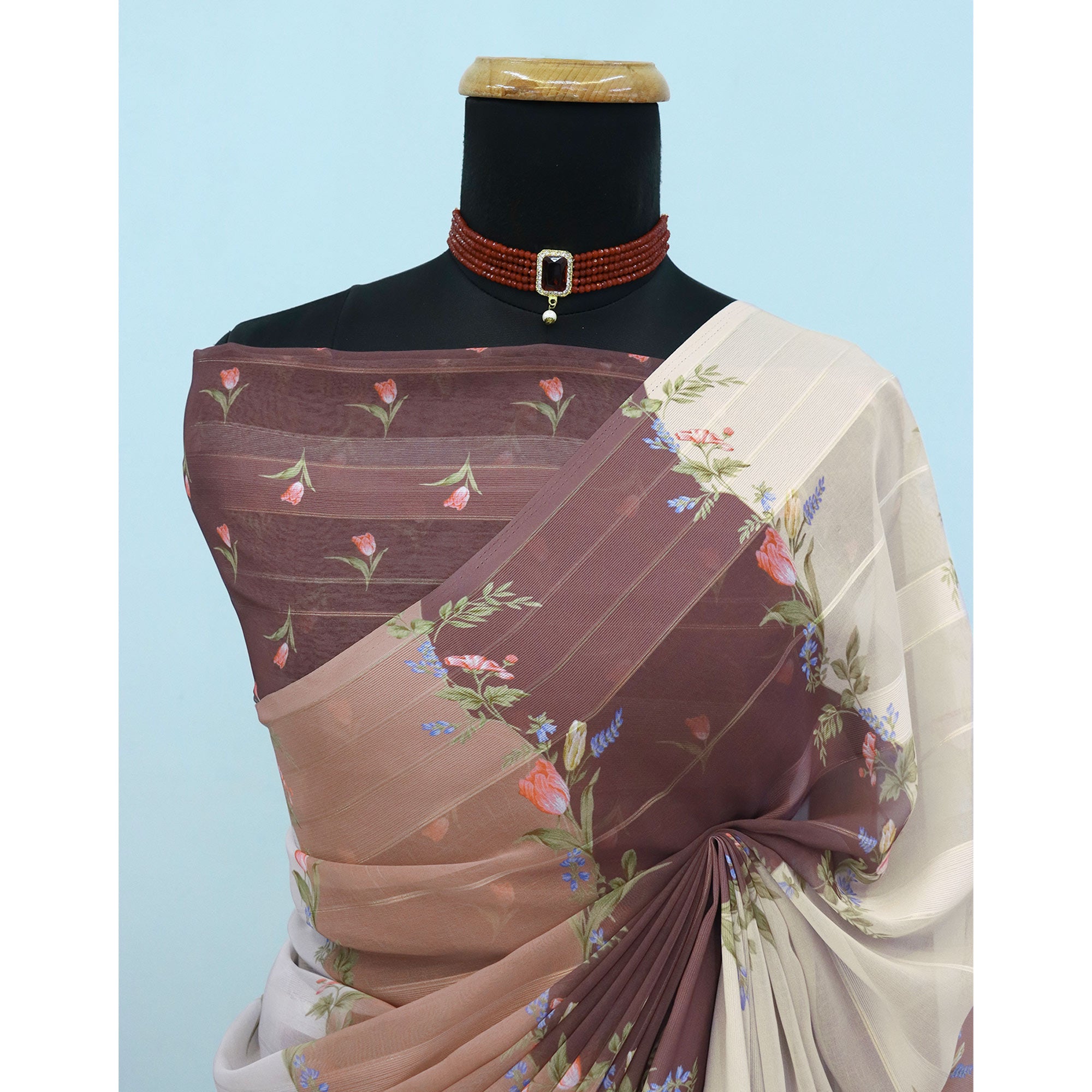 Brown Bloom Floral Digital Printed Georgette Saree Accentuated With Graceful Zari Stripes