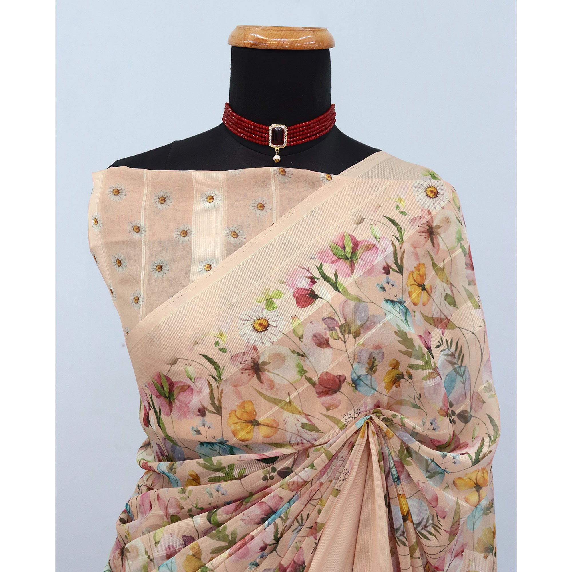 Peach Bloom Floral Digital Printed Georgette Saree Accentuated With Graceful Zari Stripes