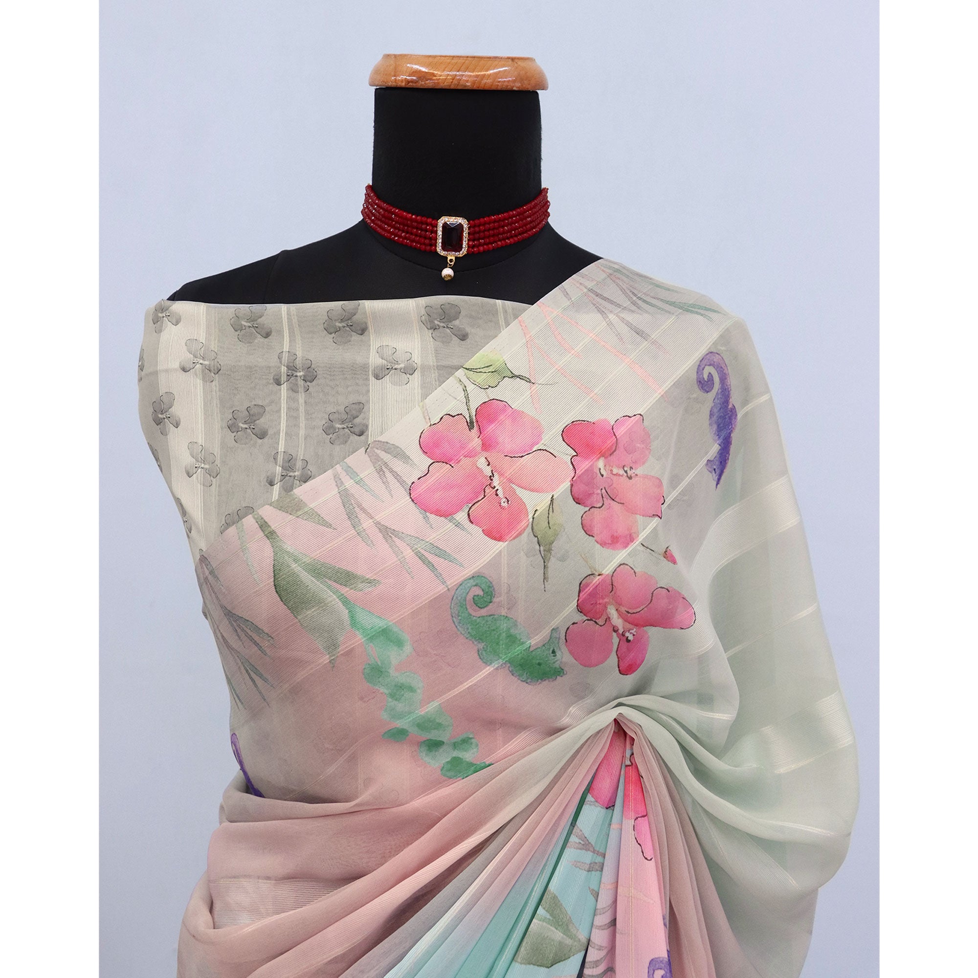 Multicolor Bloom Floral Digital Printed Georgette Saree Accentuated With Graceful Zari Stripes