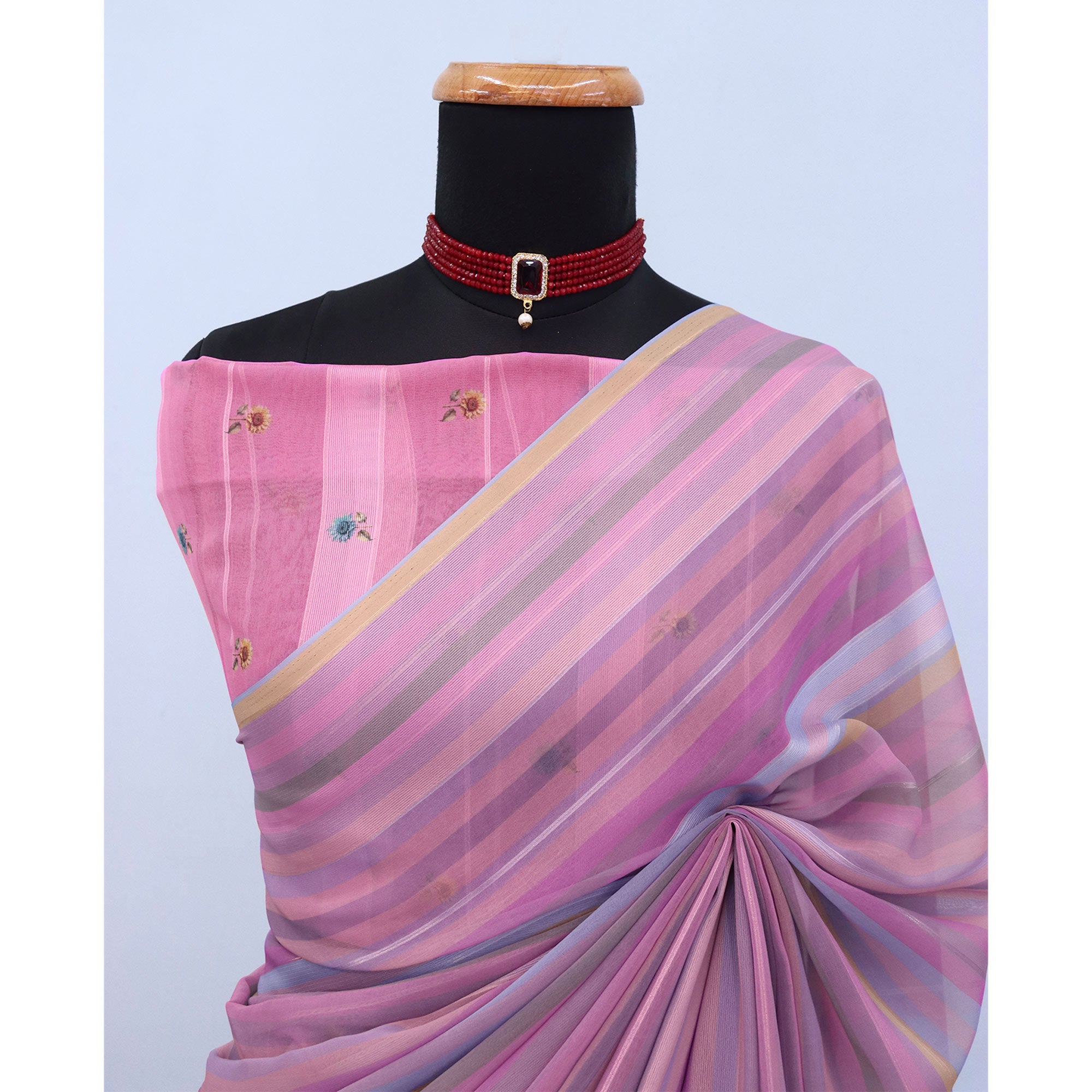 Pink Bloom Floral Digital Printed Georgette Saree Accentuated With Graceful Zari Stripes