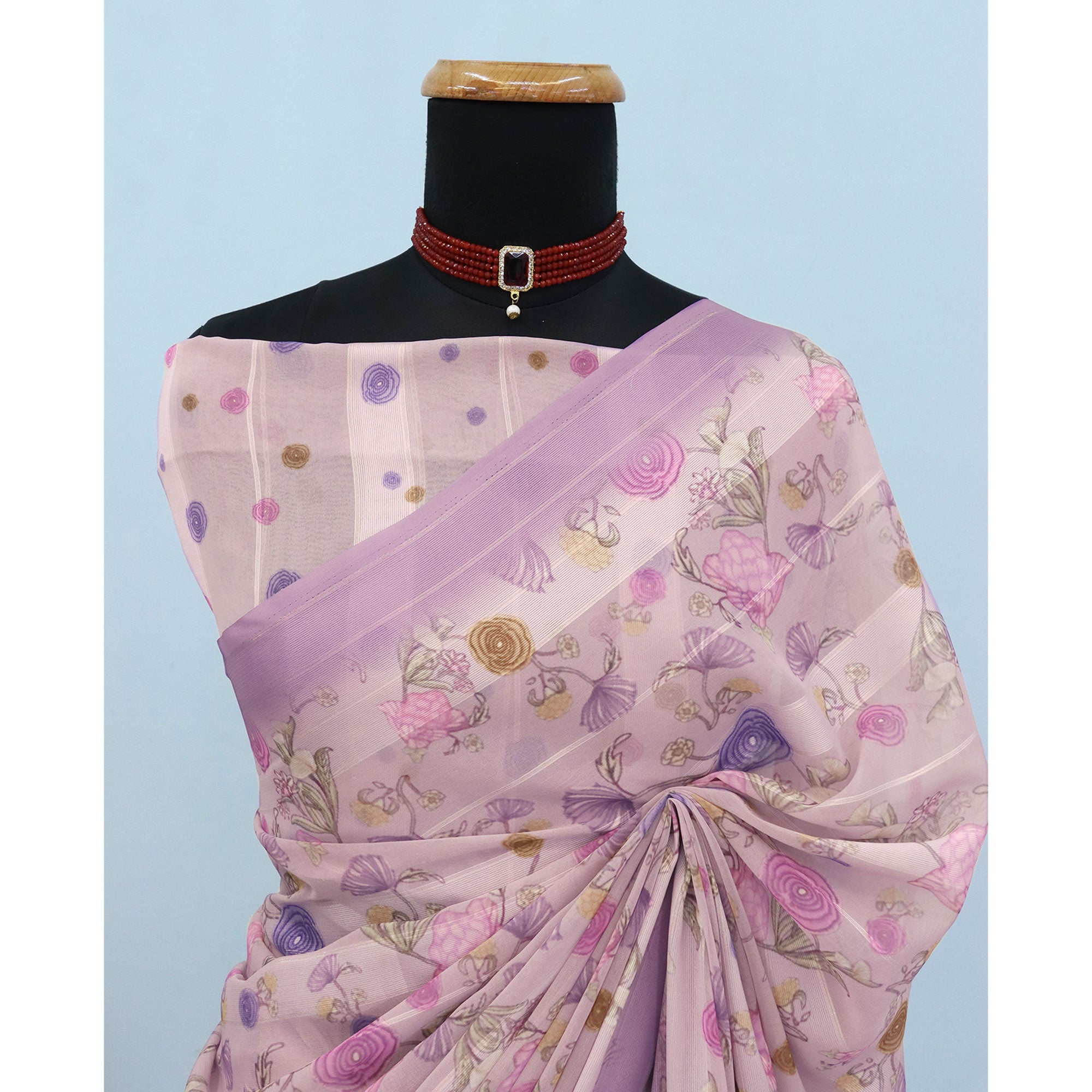 Purple Bloom Floral Digital Printed Georgette Saree Accentuated With Graceful Zari Stripes
