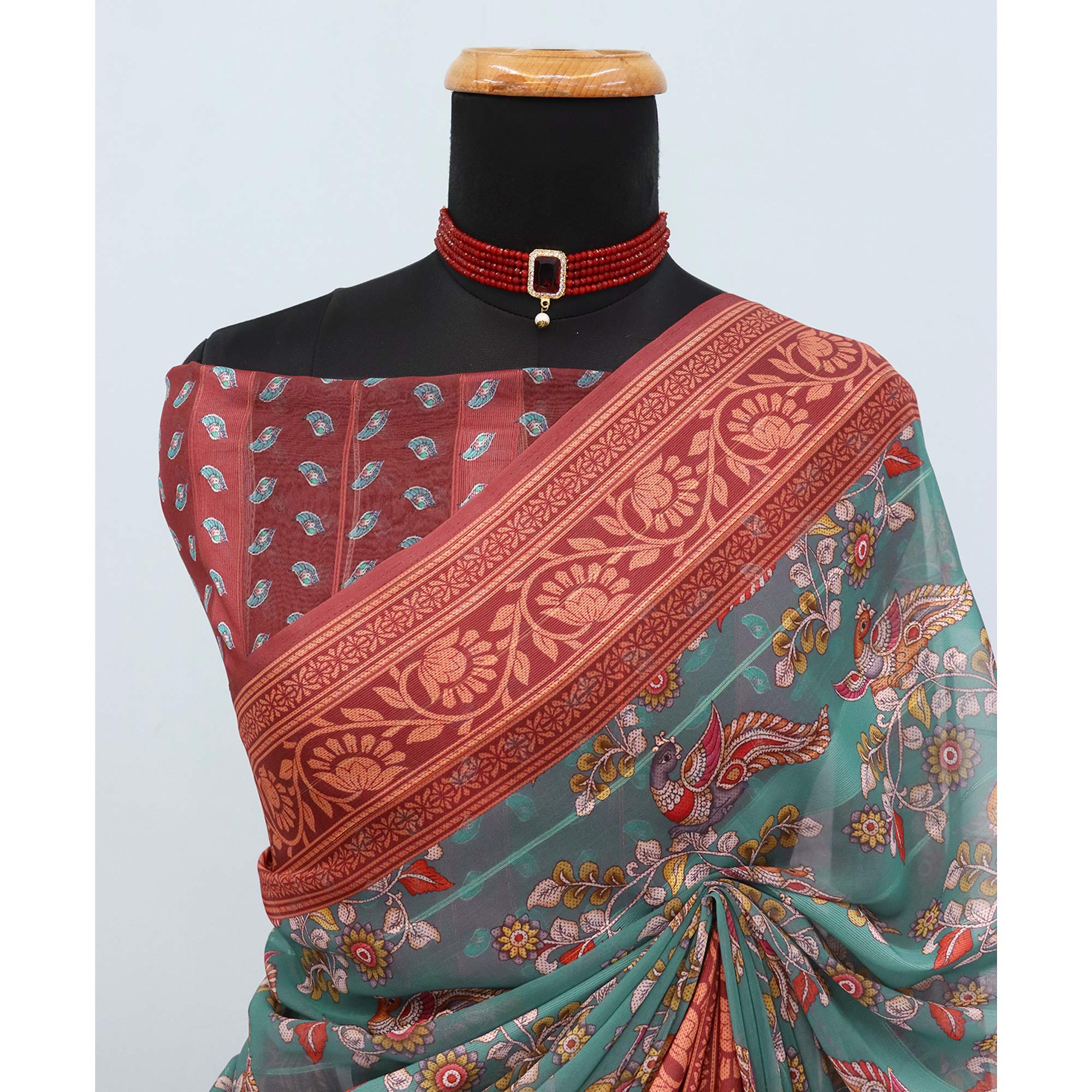 Elegant Rama Green & Maroon Floral Digital Printed Georgette Saree Adorned With Subtle Zari Stripes