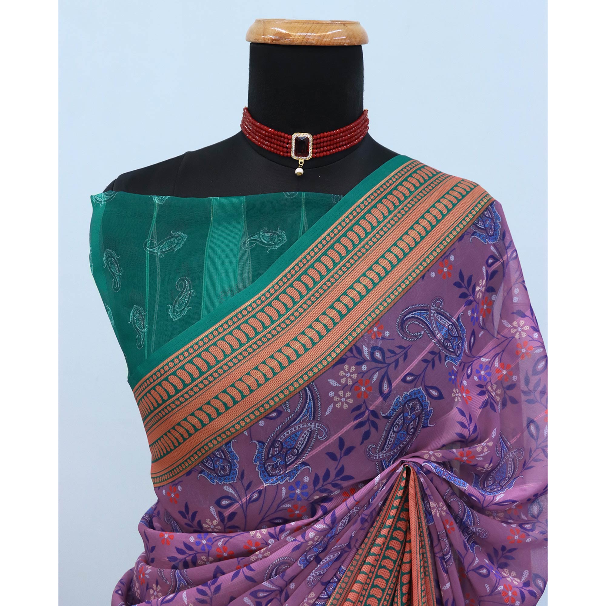 Elegant Violet & Green Floral Digital Printed Georgette Saree Adorned With Subtle Zari Stripes