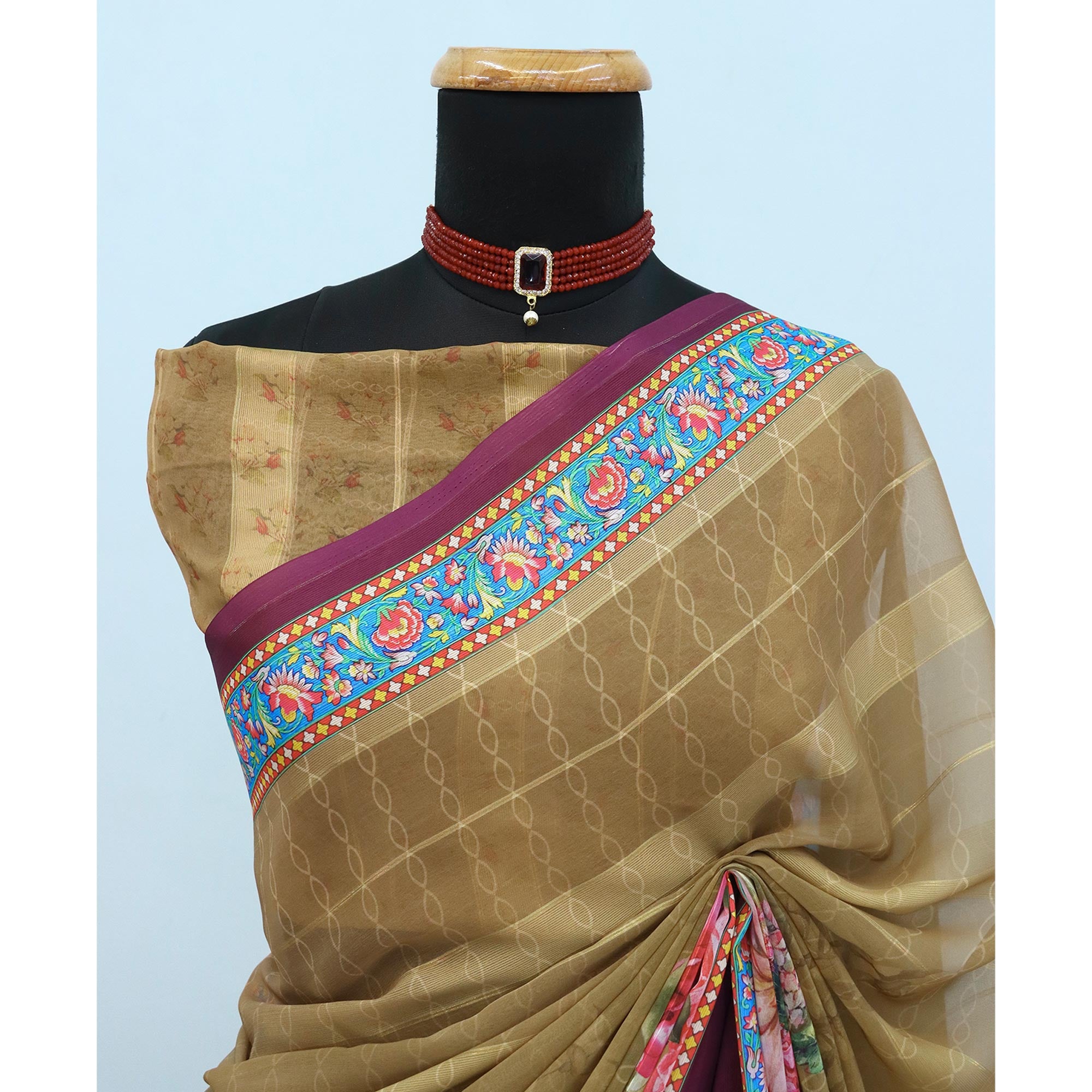 Charming Mehendi & Green Floral Digital Printed Georgette Saree Accentuated With Zari Stripes