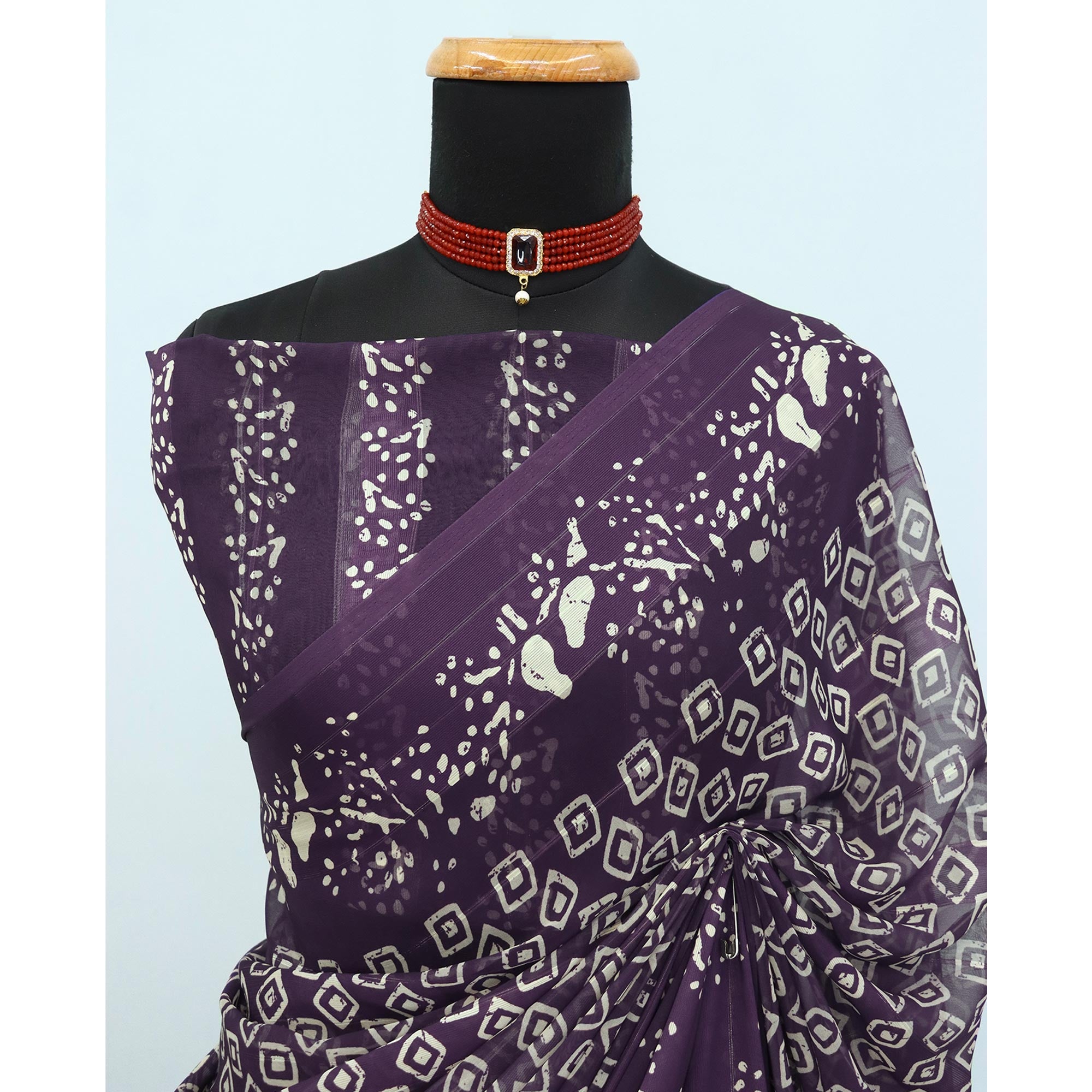 Charming Purple Geometric Digital Printed Georgette Saree Accentuated With Zari Stripes