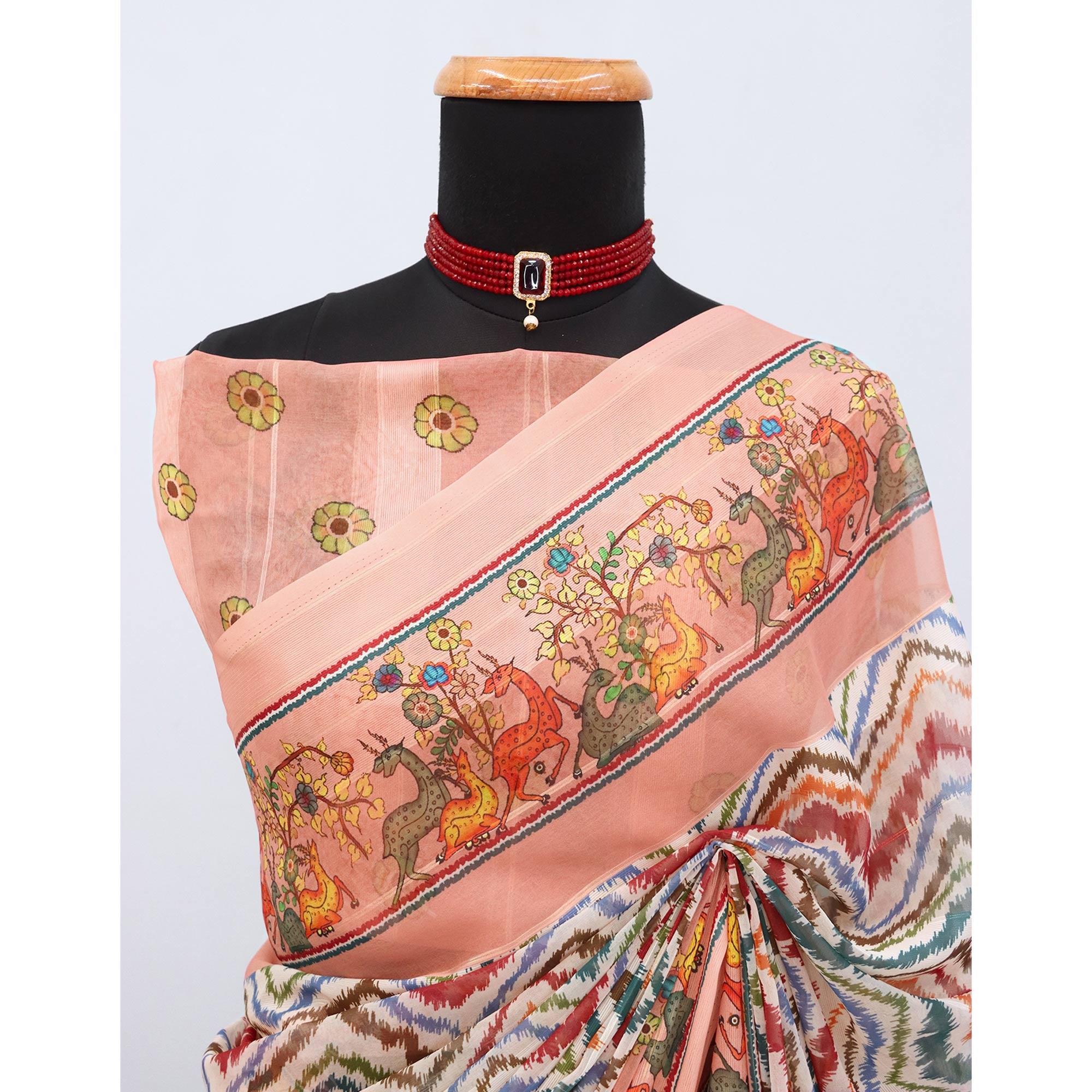Charming Peach Zig Zag & Floral Digital Printed Georgette Saree Accentuated With Zari Stripes