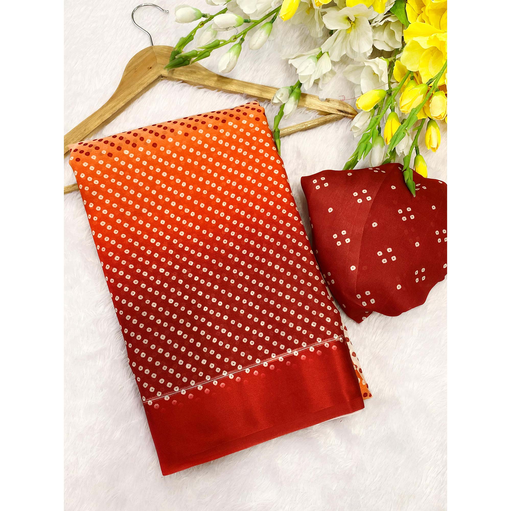 Designer Bandhani Saree in Off White & Red Crafted from Soft Moss Georgette