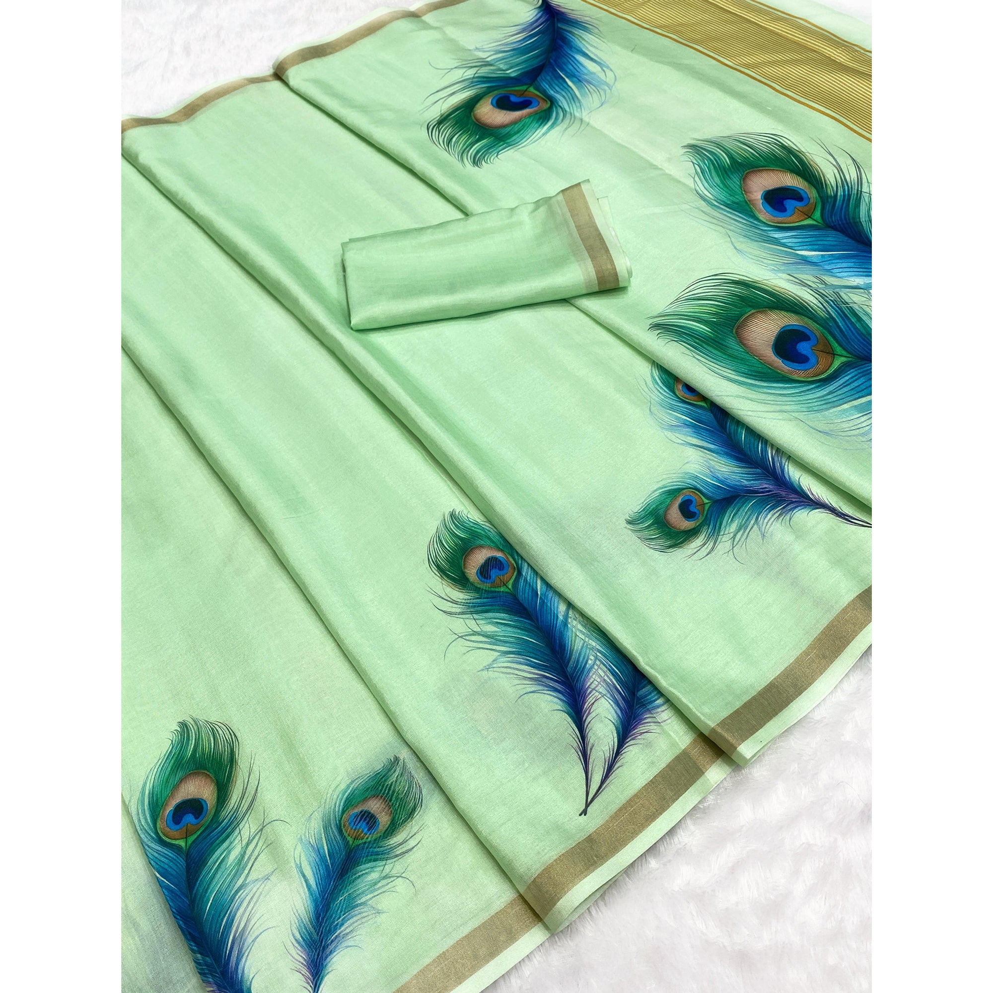 Charming Mint Green Soft Tussar Cotton Silk Saree With Peacock Feathers Print