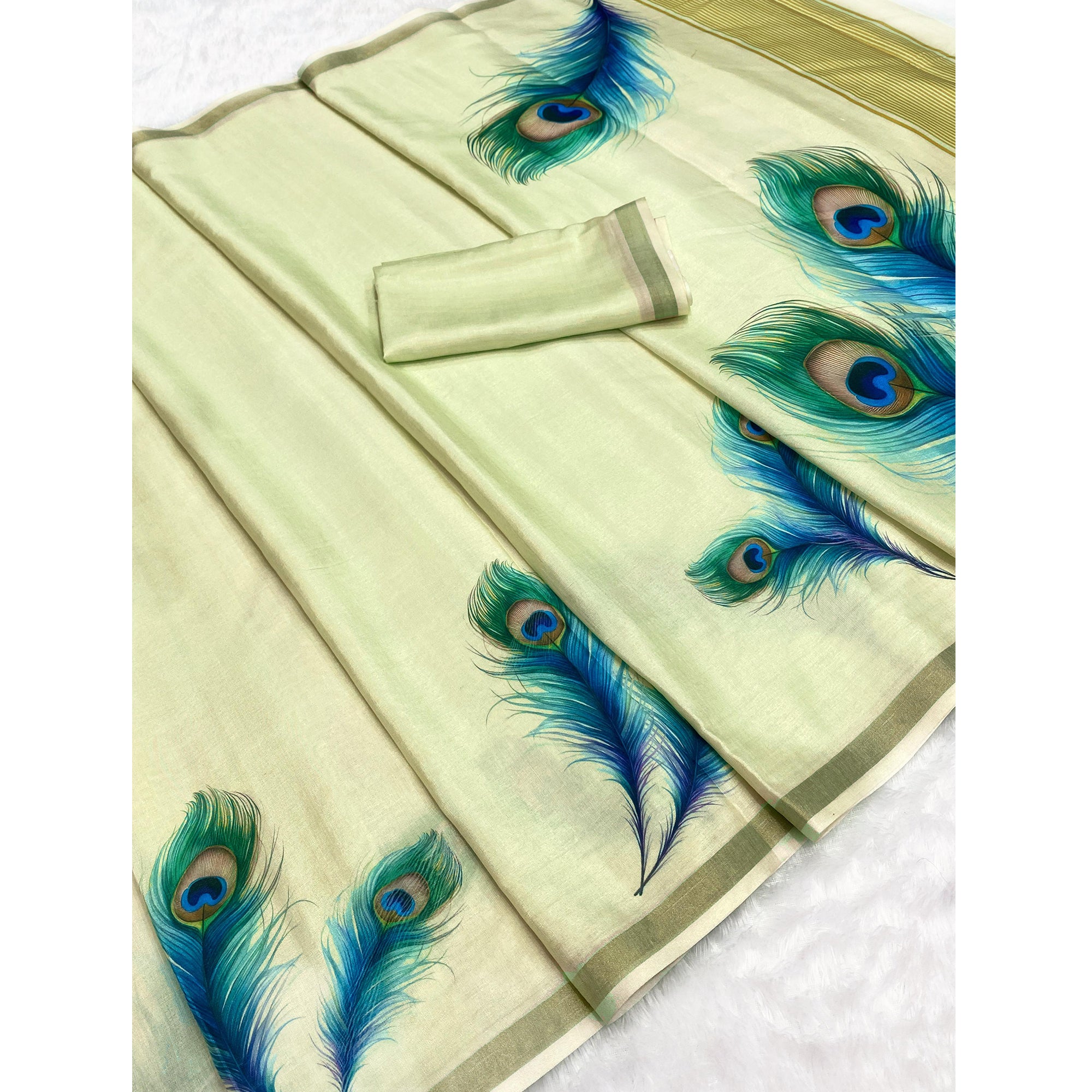 Charming Pista Green Soft Tussar Cotton Silk Saree With Peacock Feathers Print