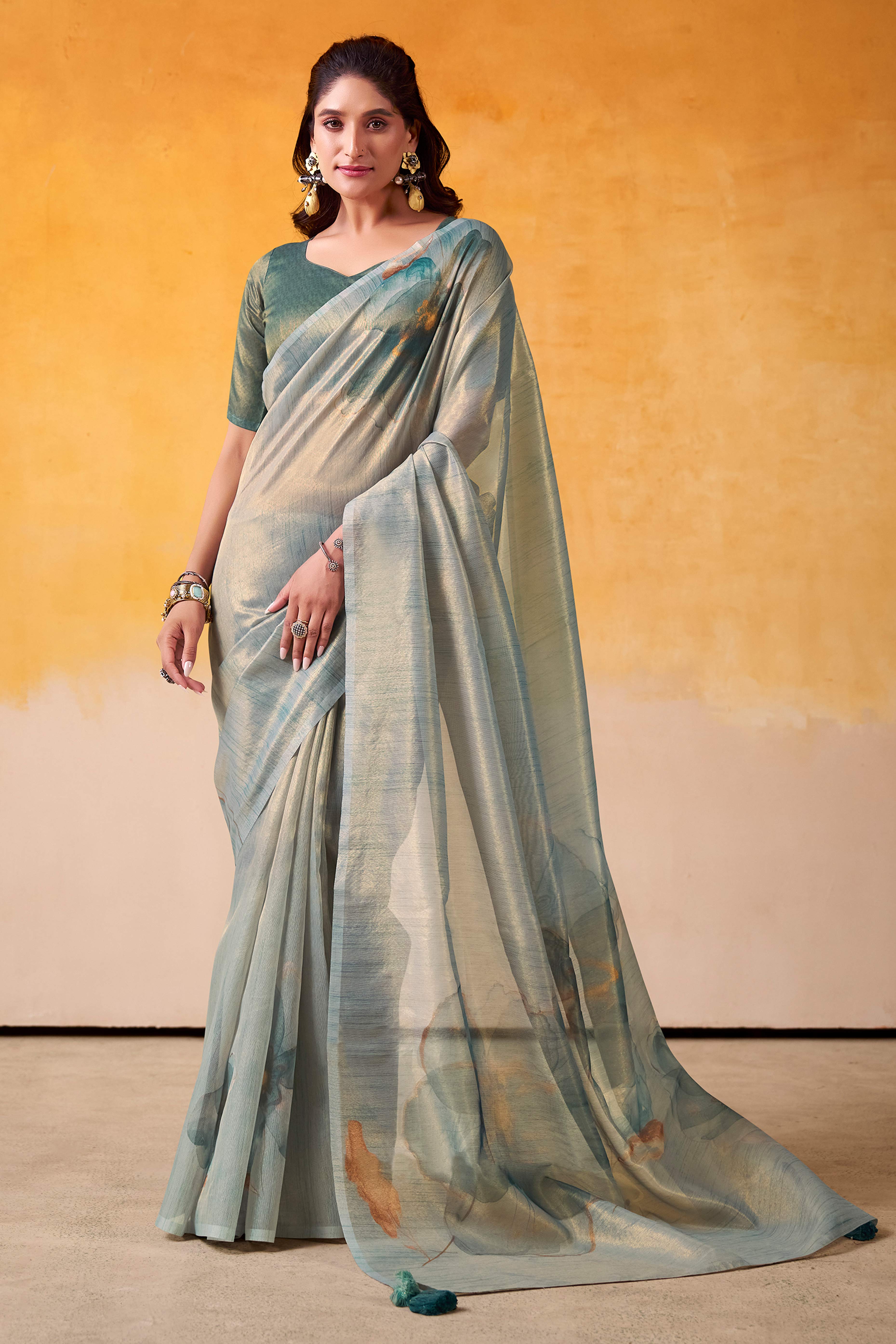 Sophisticated Blue Floral Digital Print Tissue Saree Enhanced With Handmade Tassels