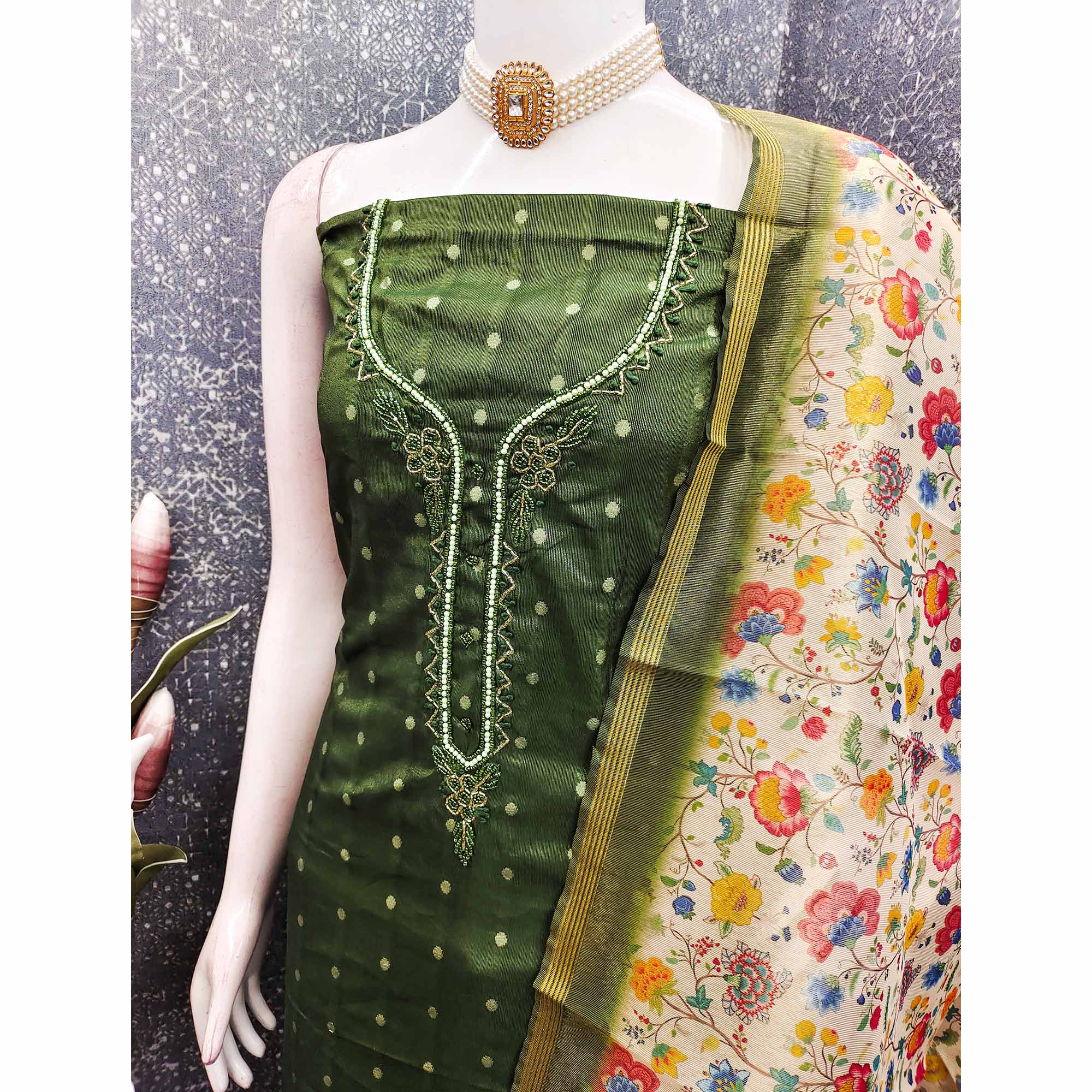 Festive Mehendi Green Net Dress Material Accented with Intricate Zari Weaving