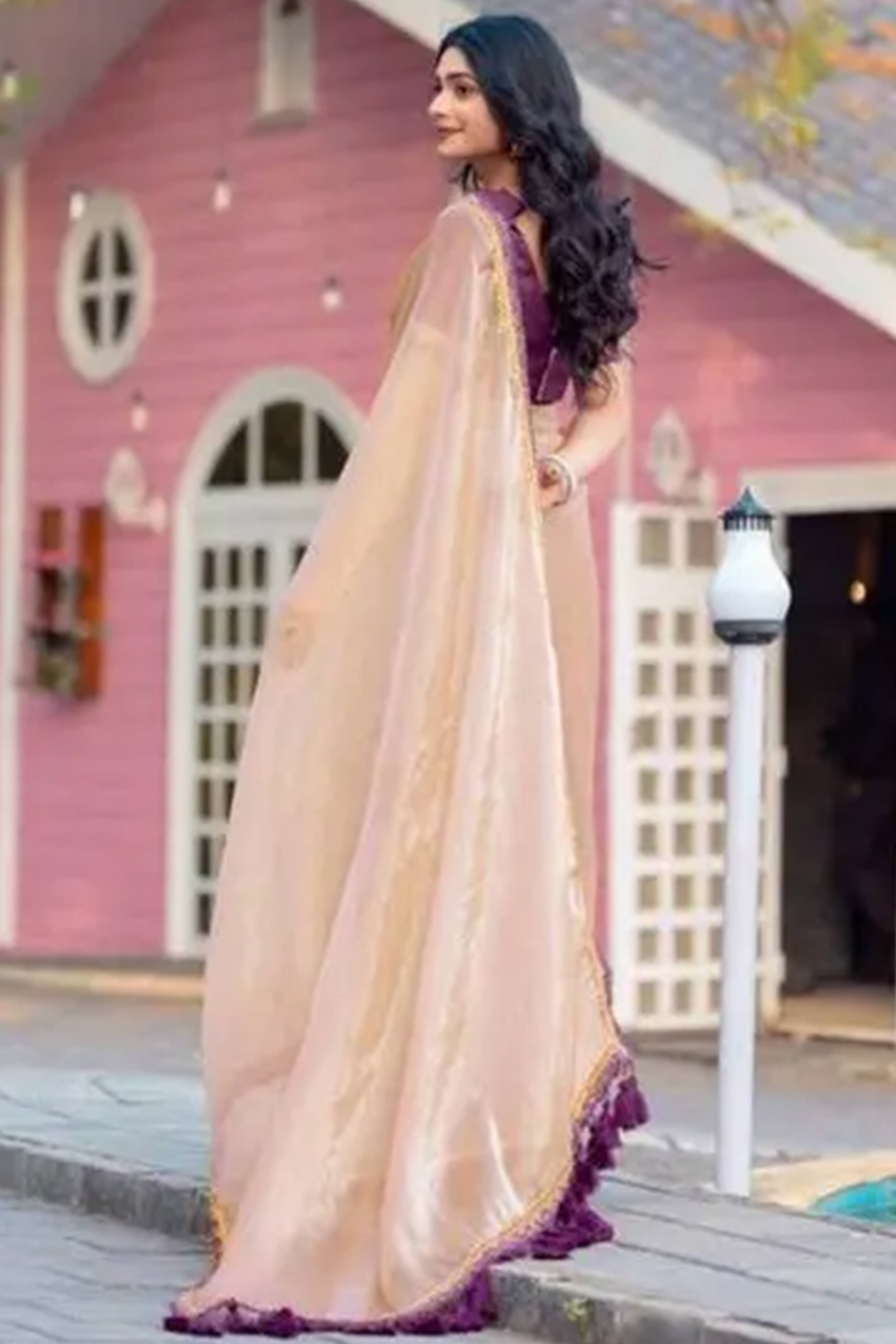 Beige Solid Tissue Saree Enhanced With Graceful Embroidered Lace Border Work