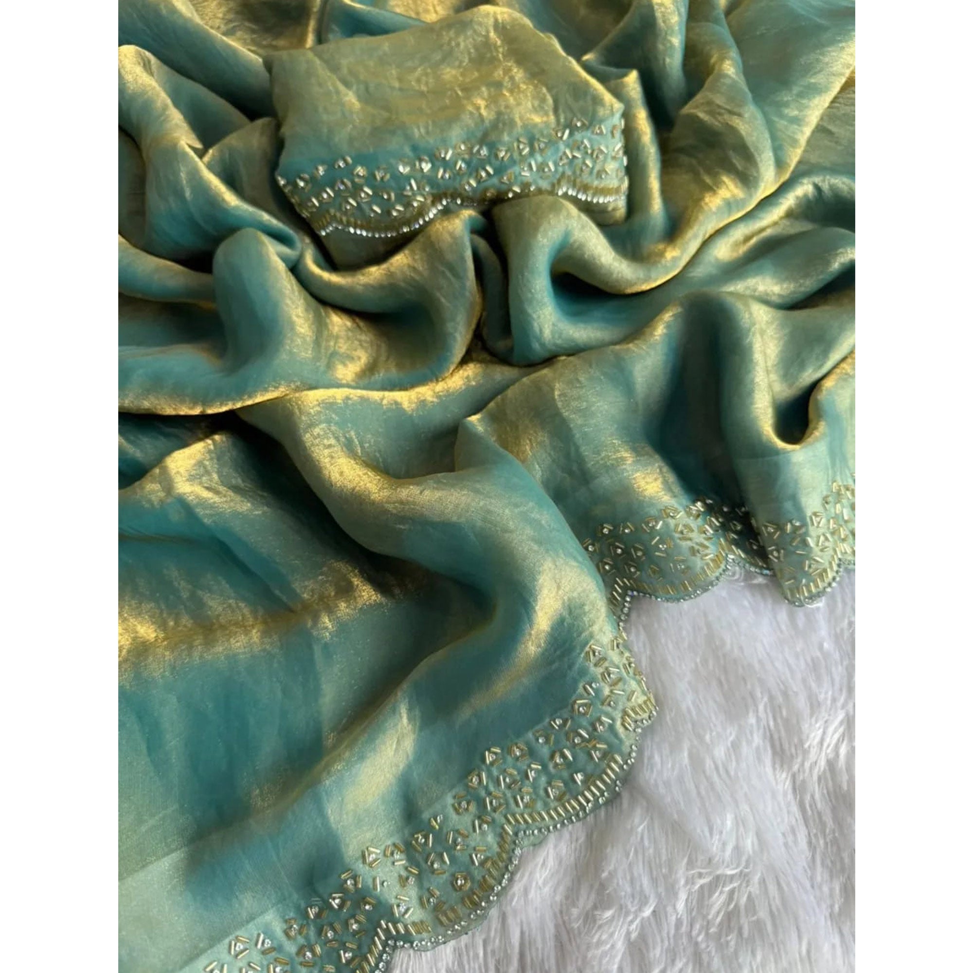 Elegant Sea Green Satin Saree Embellished in Gold Shine