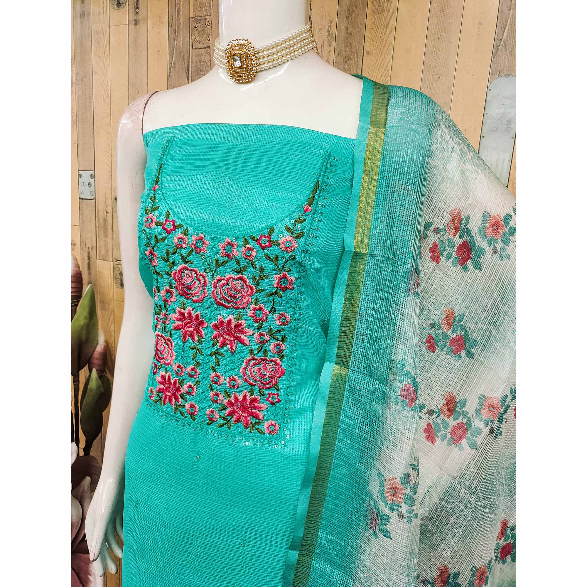 Turquoise Kota Doria Dress Material Featuring Elegant Floral Design With Sparkling Sequins Embroidery