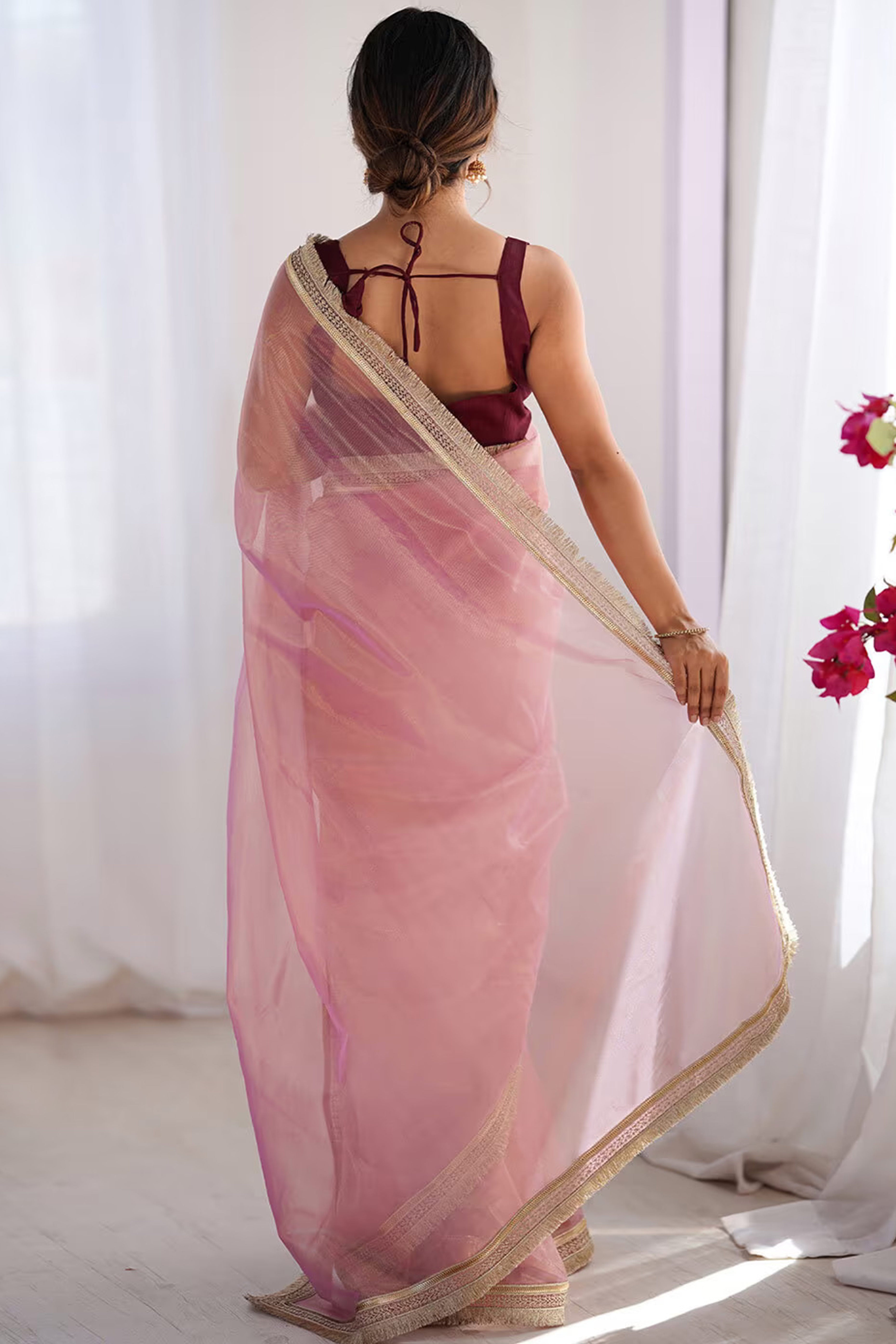 Feminine Rose Pink Solid Net Saree with Sophisticated Lace Border Work