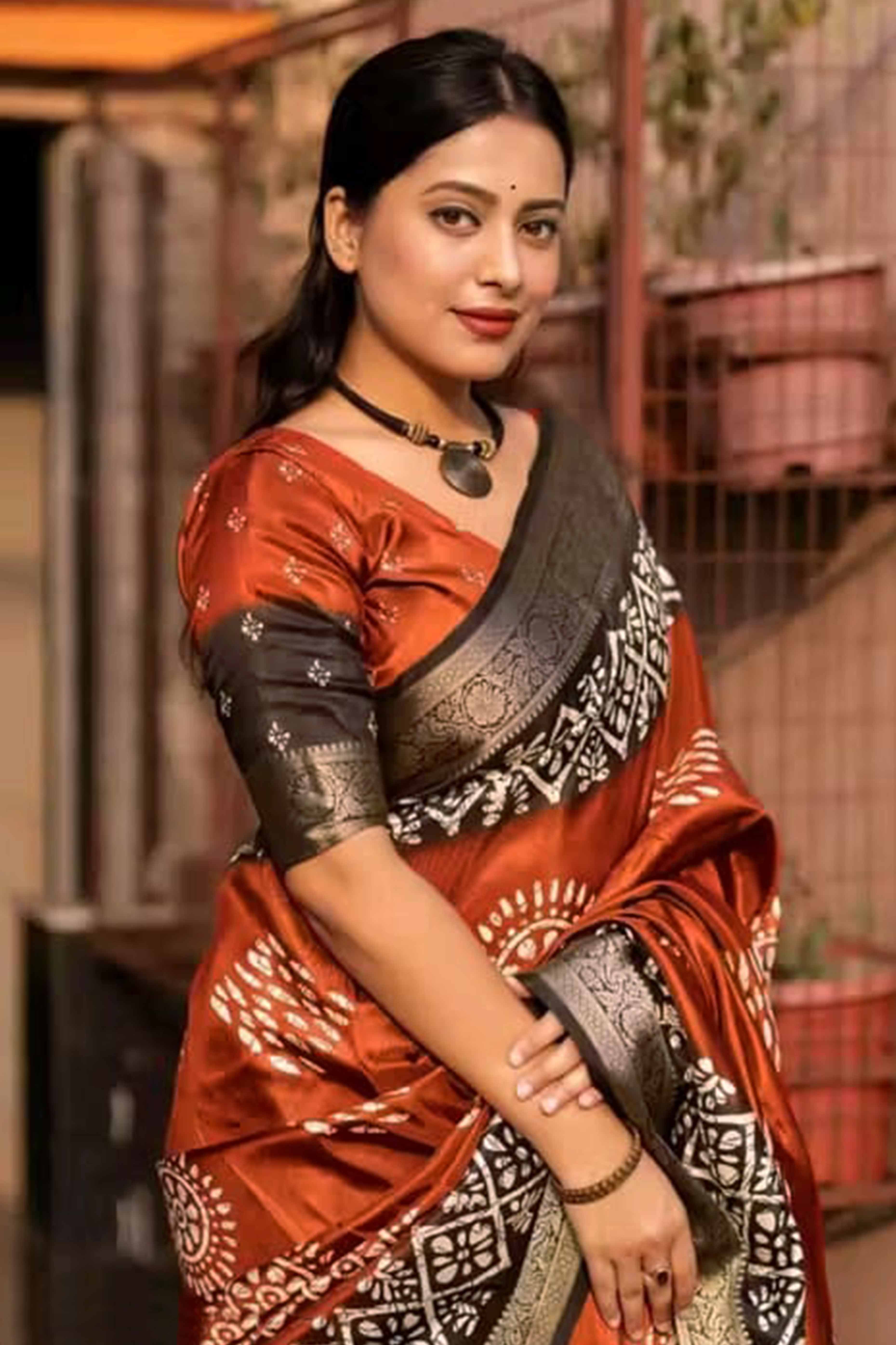 Exclusive Brown Batik Printed Saree in Soft Dola Silk Fabric with Intricate Detailing