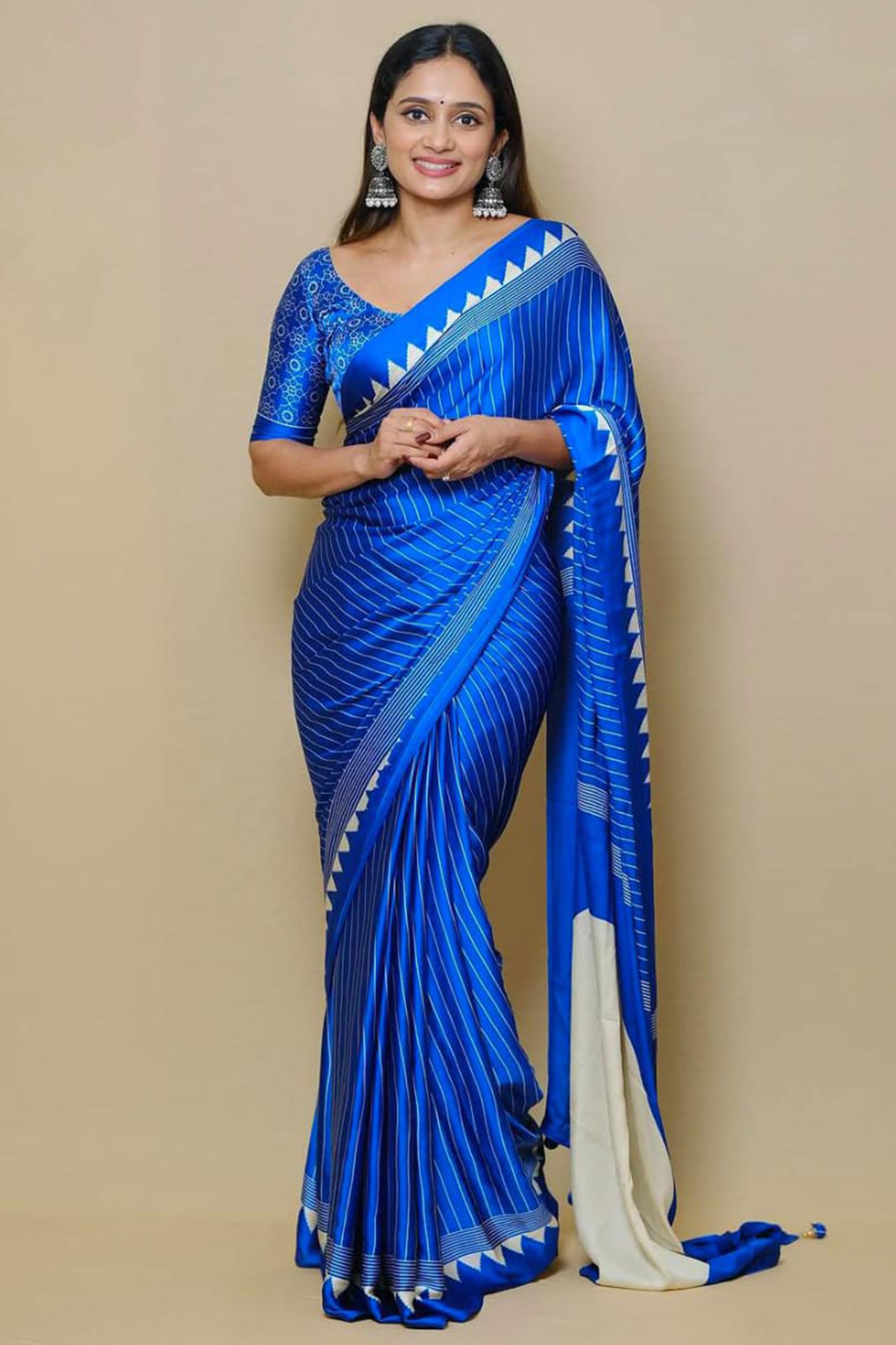 Blue Crepe Saree with Bold Striped Print and Smooth Finish for Partywear
