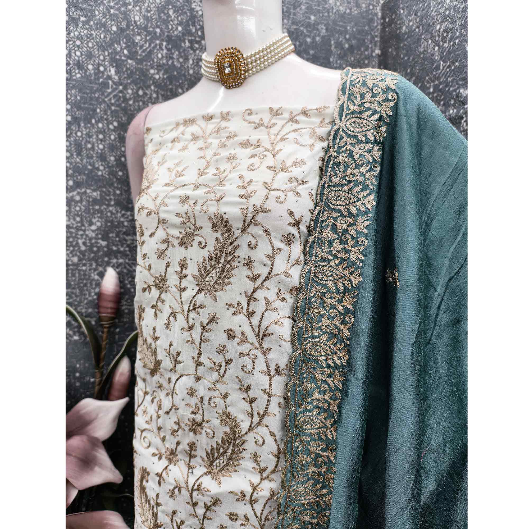 Cream & Teal Lustrous Vichitra Silk Dress Material Accented with Artistic Thread Embroidery