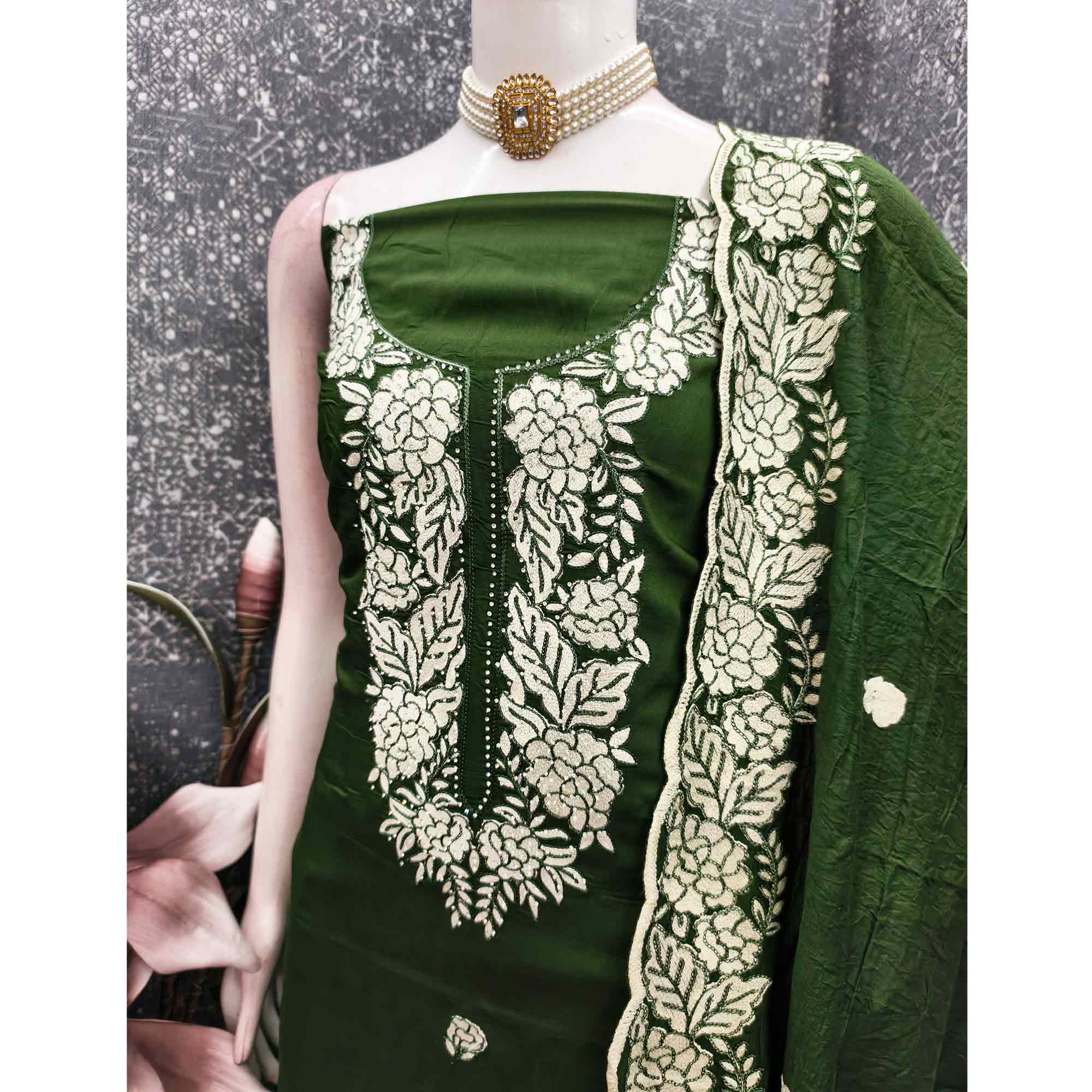 Bottle Green Rich Viscose Dress Material Highlighted with Refined Floral Thread Embroidery