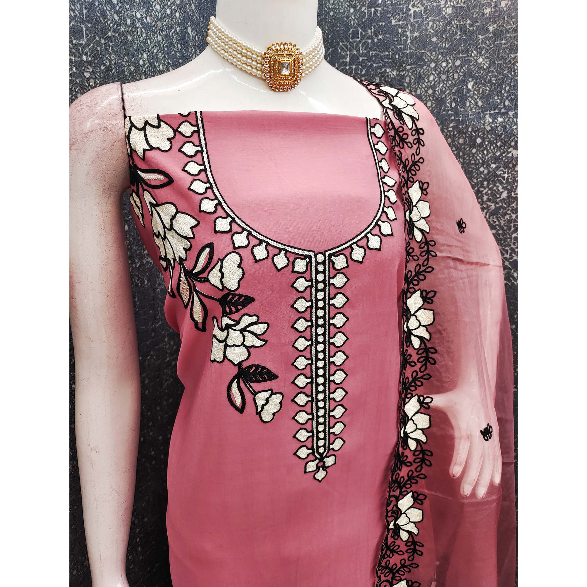 Graceful Gajari Pink Floral Viscose Dress Material Enhanced With Intricate Thread Embroidery Work