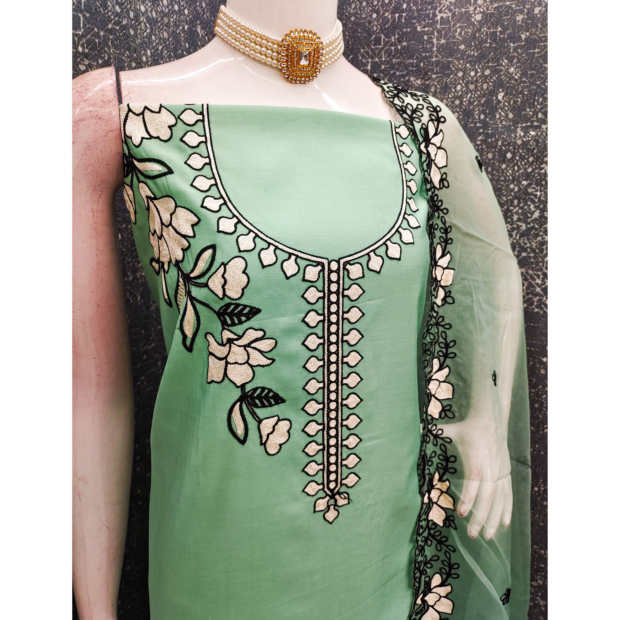 Graceful Mint Green Floral Viscose Dress Material Enhanced With Intricate Thread Embroidery Work