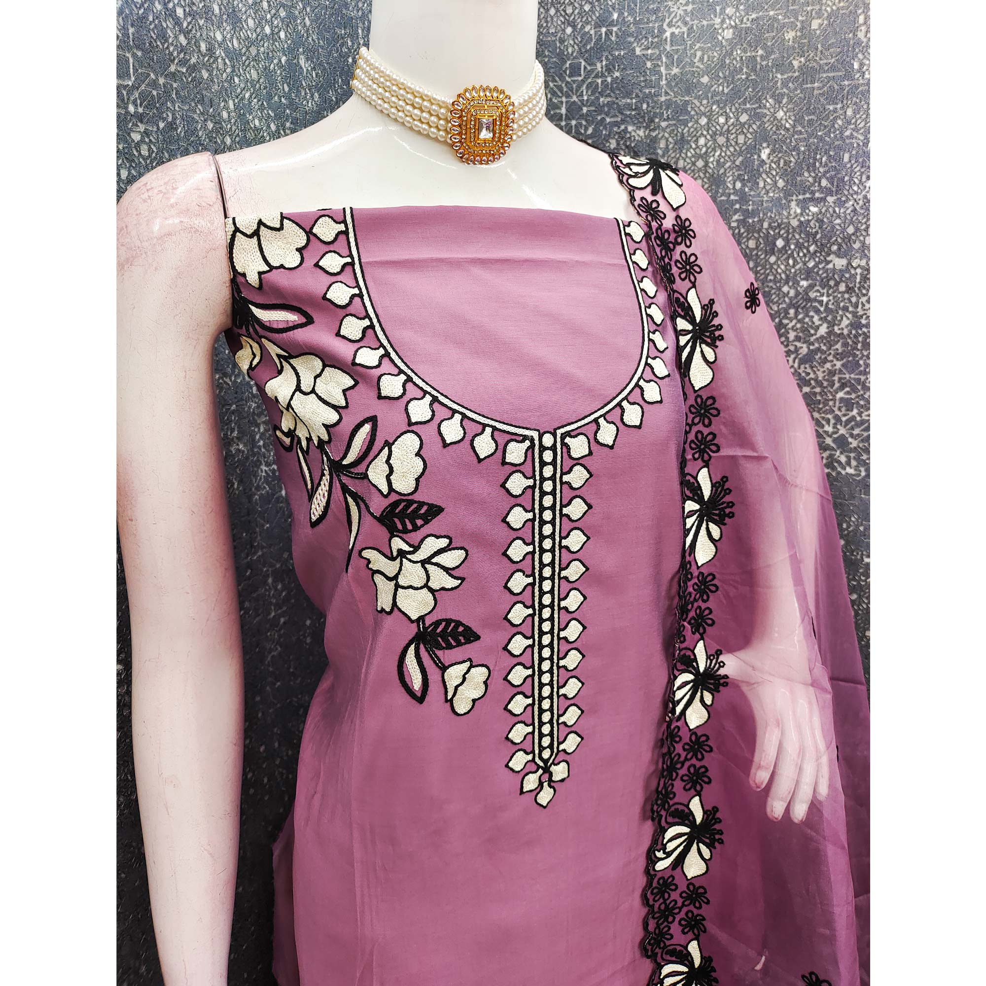 Graceful Pale Magenta Floral Viscose Dress Material Enhanced With Intricate Thread Embroidery Work