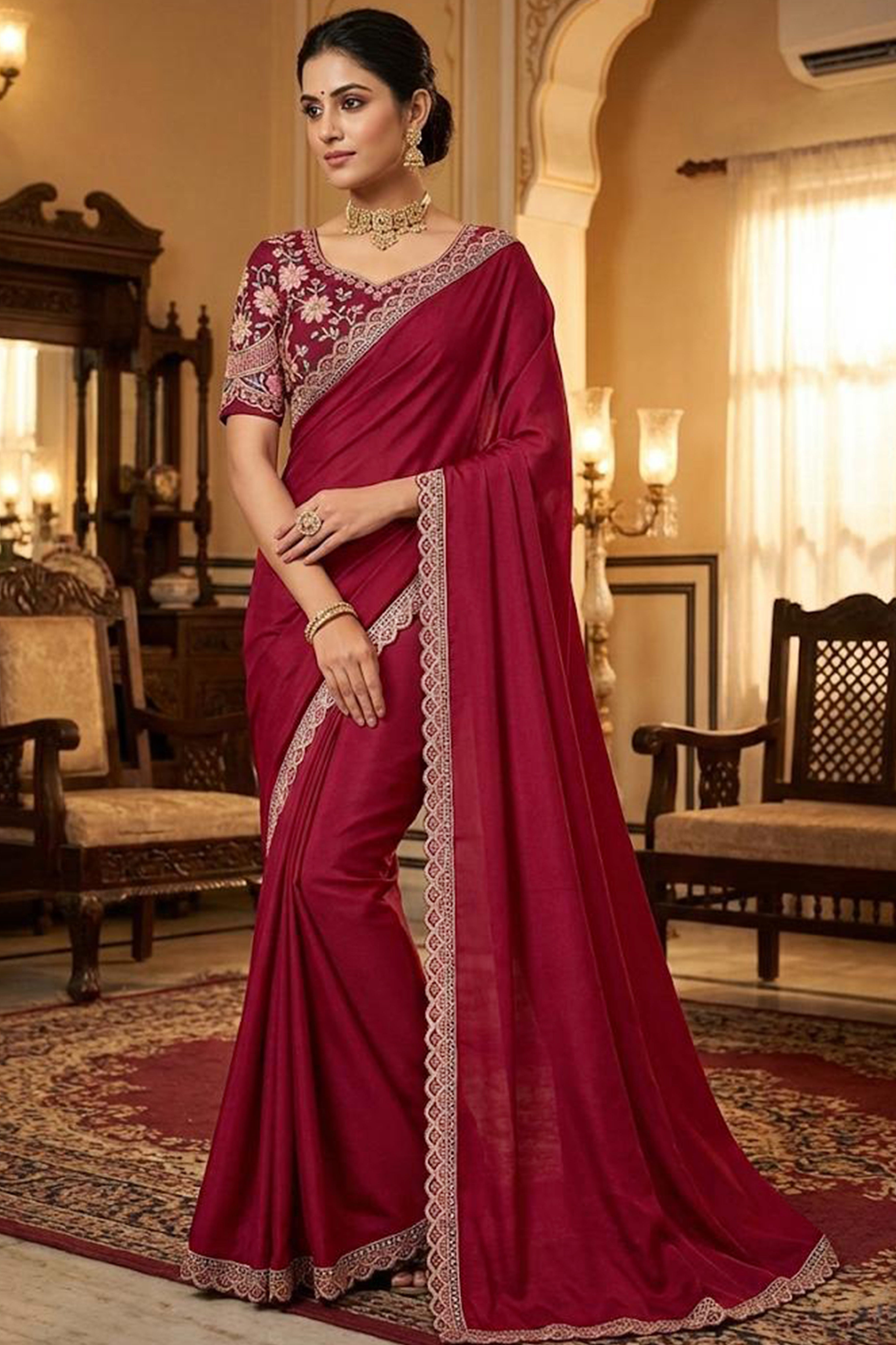 Maroon Solid Georgette Saree With Embroidered Blouse Piece And Embroidered Border
