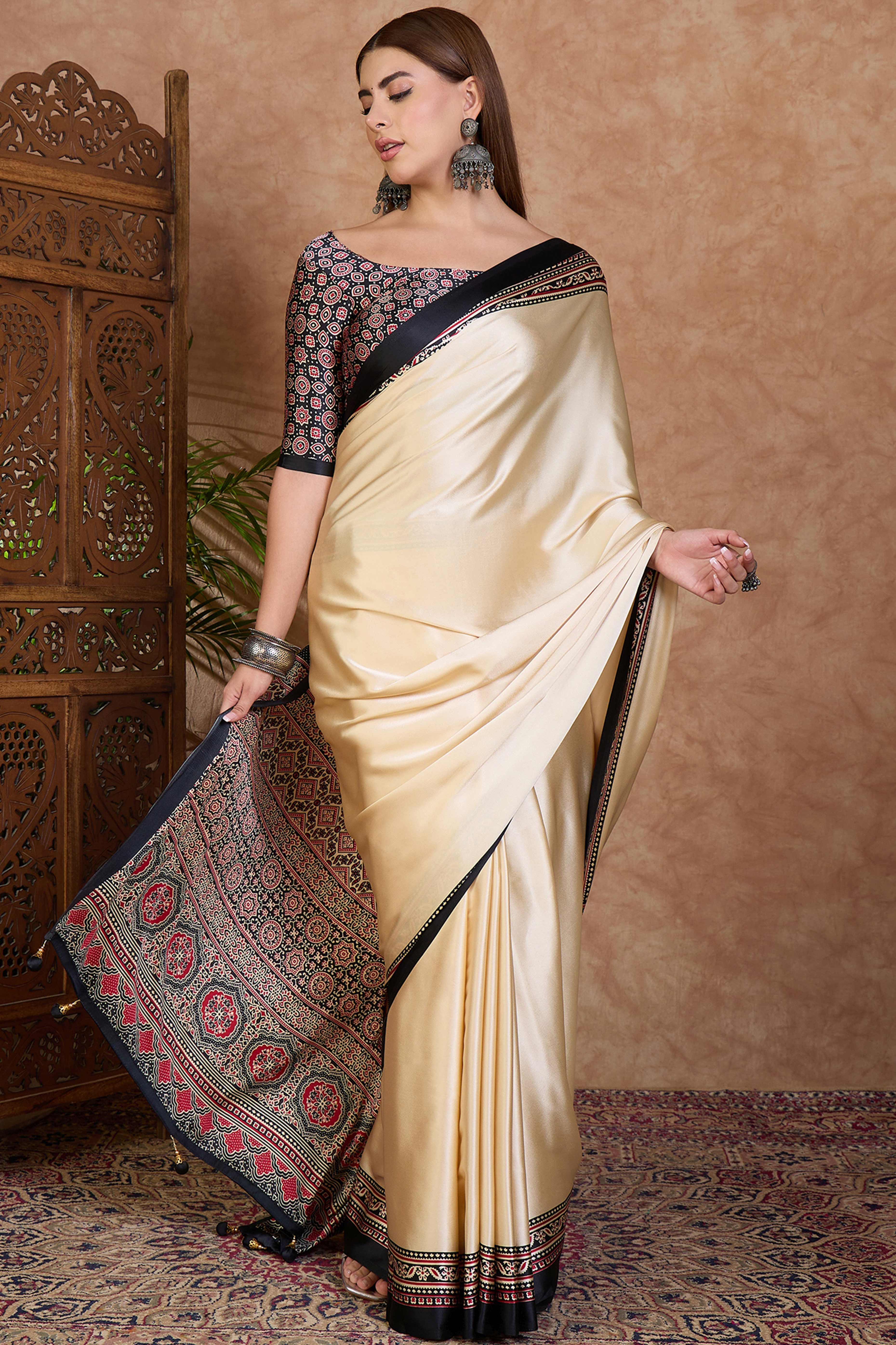 Cream & Black Modal Satin Saree Featuring a Solid Base and Artisanal Ajrakh Pallu
