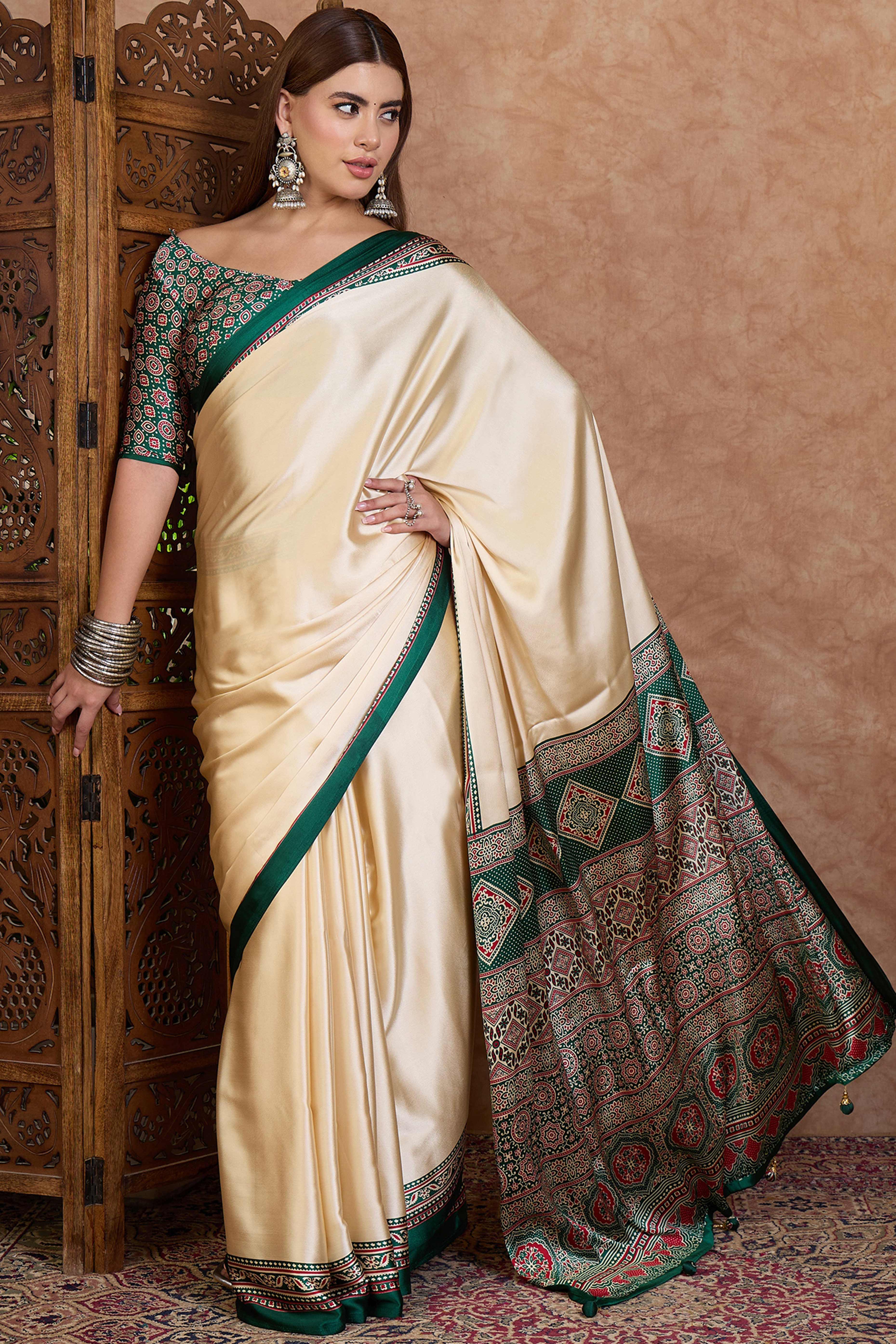Cream & Green Modal Satin Saree Featuring a Solid Base and Artisanal Ajrakh Pallu
