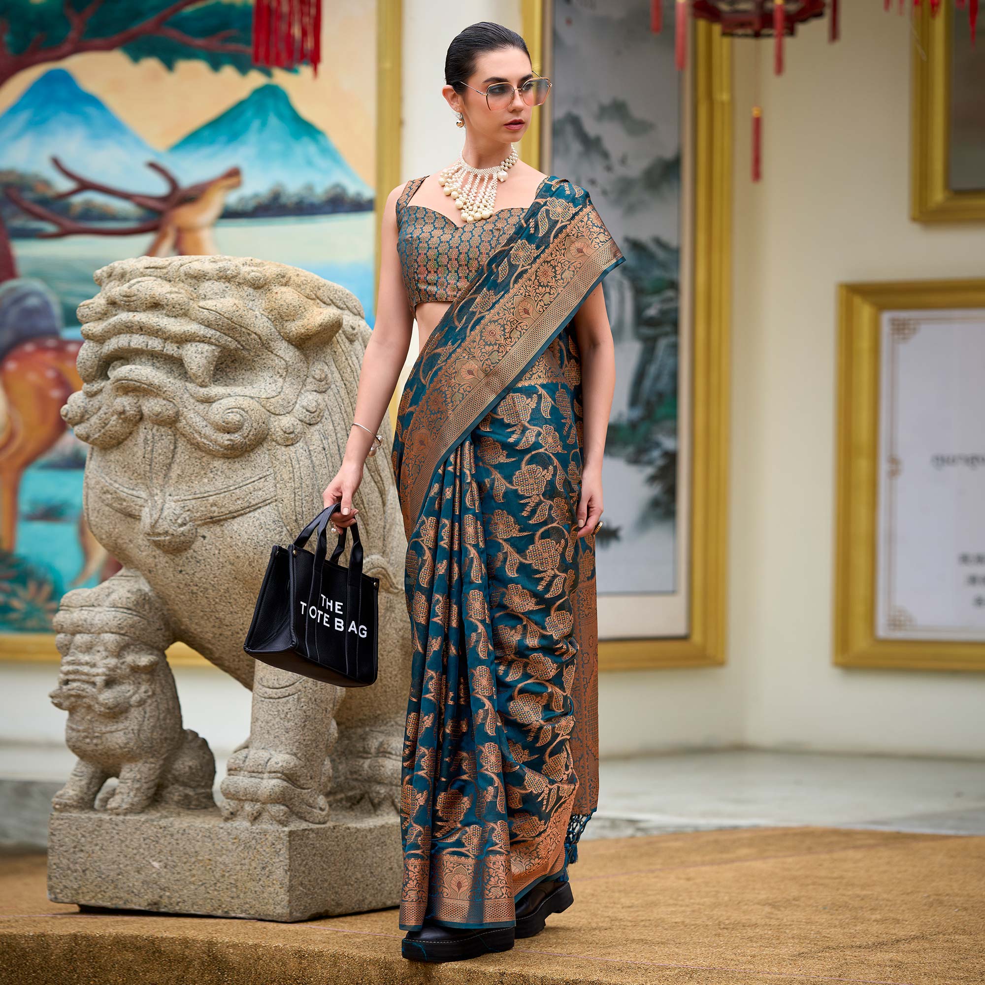 Teal Floral Motifs Woven Organza Saree