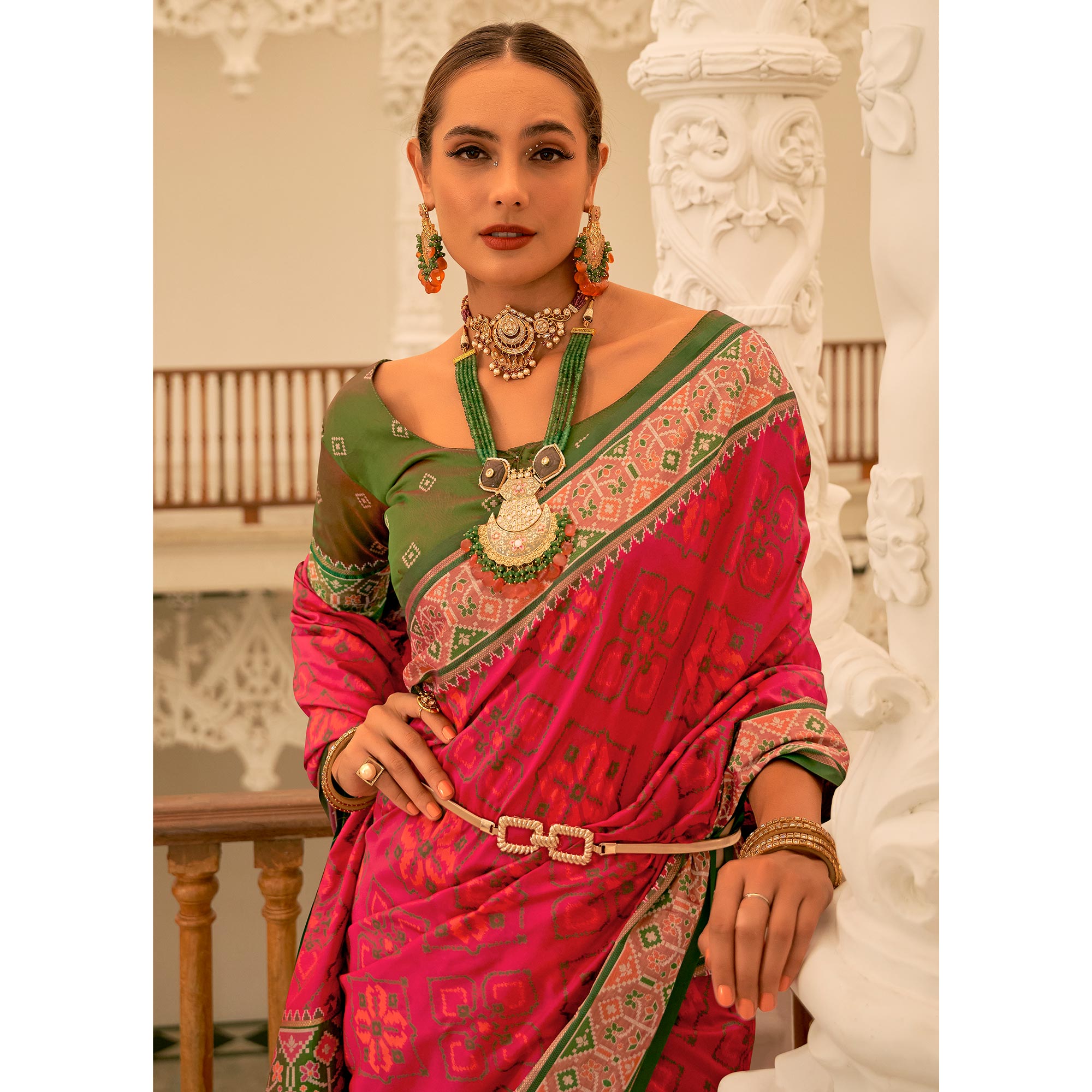 Rani Pink Patola Printed Banarasi Silk Saree With Tassels