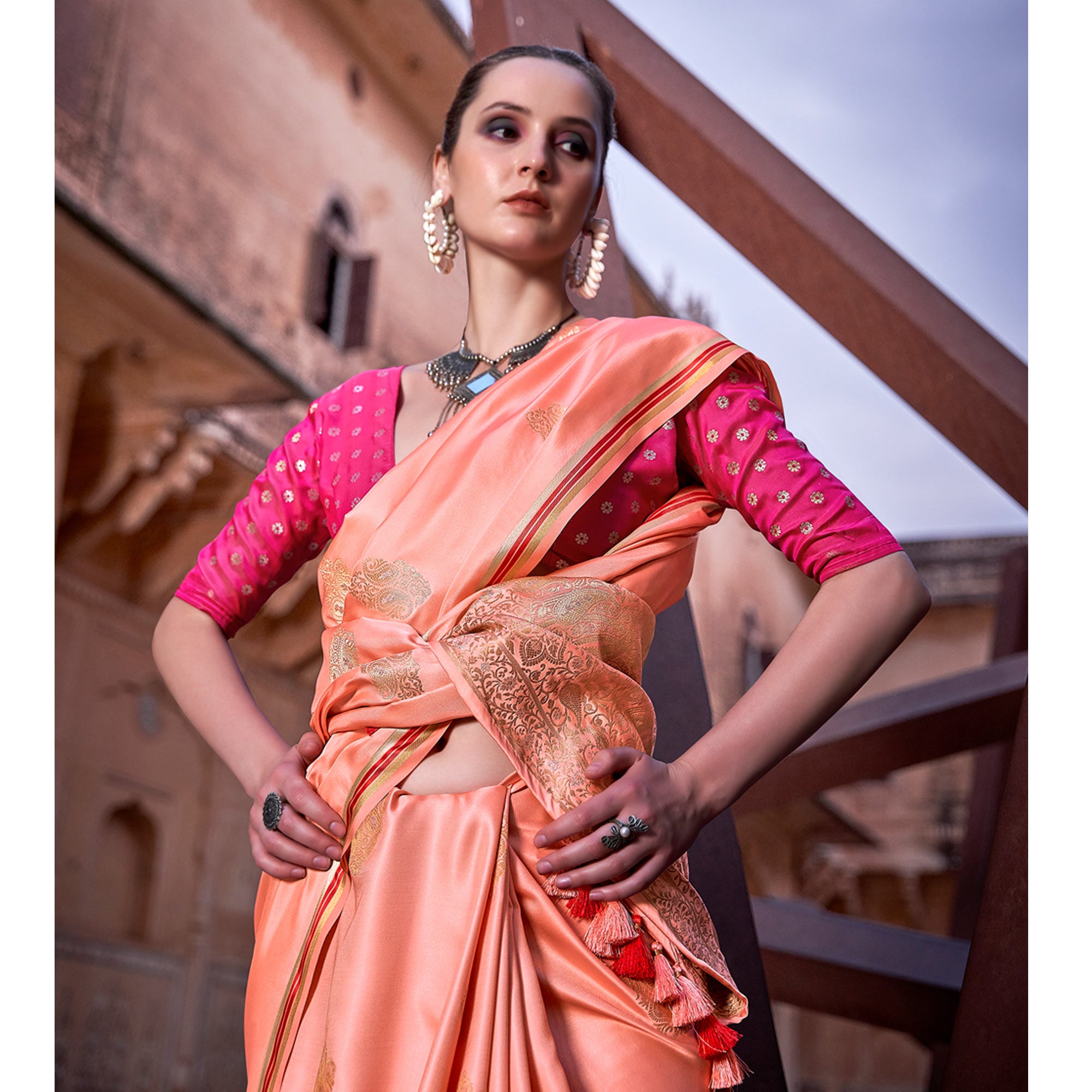 Peach Woven Satin Saree With Tassels