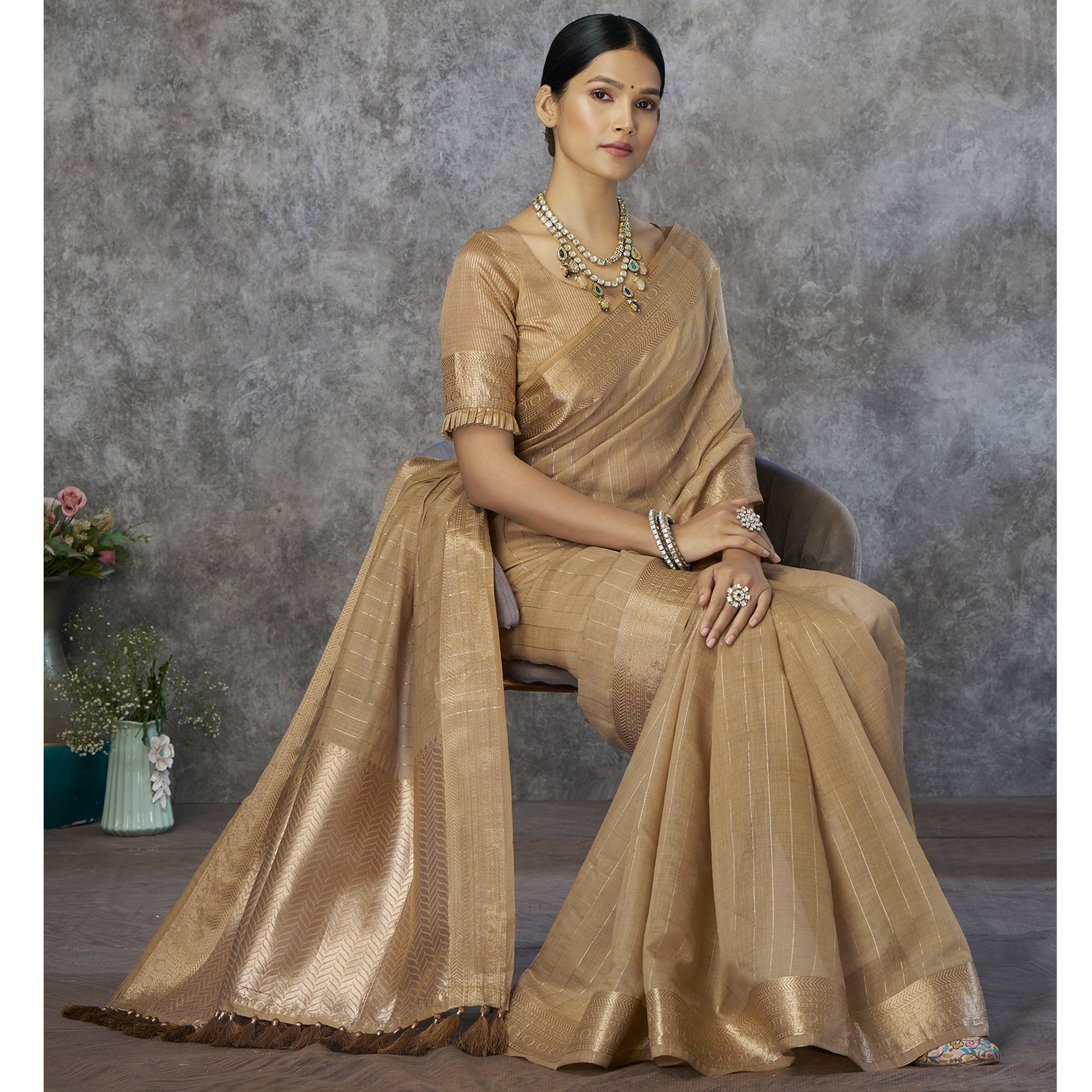 Chikoo Woven Cotton Silk Saree With Tassels