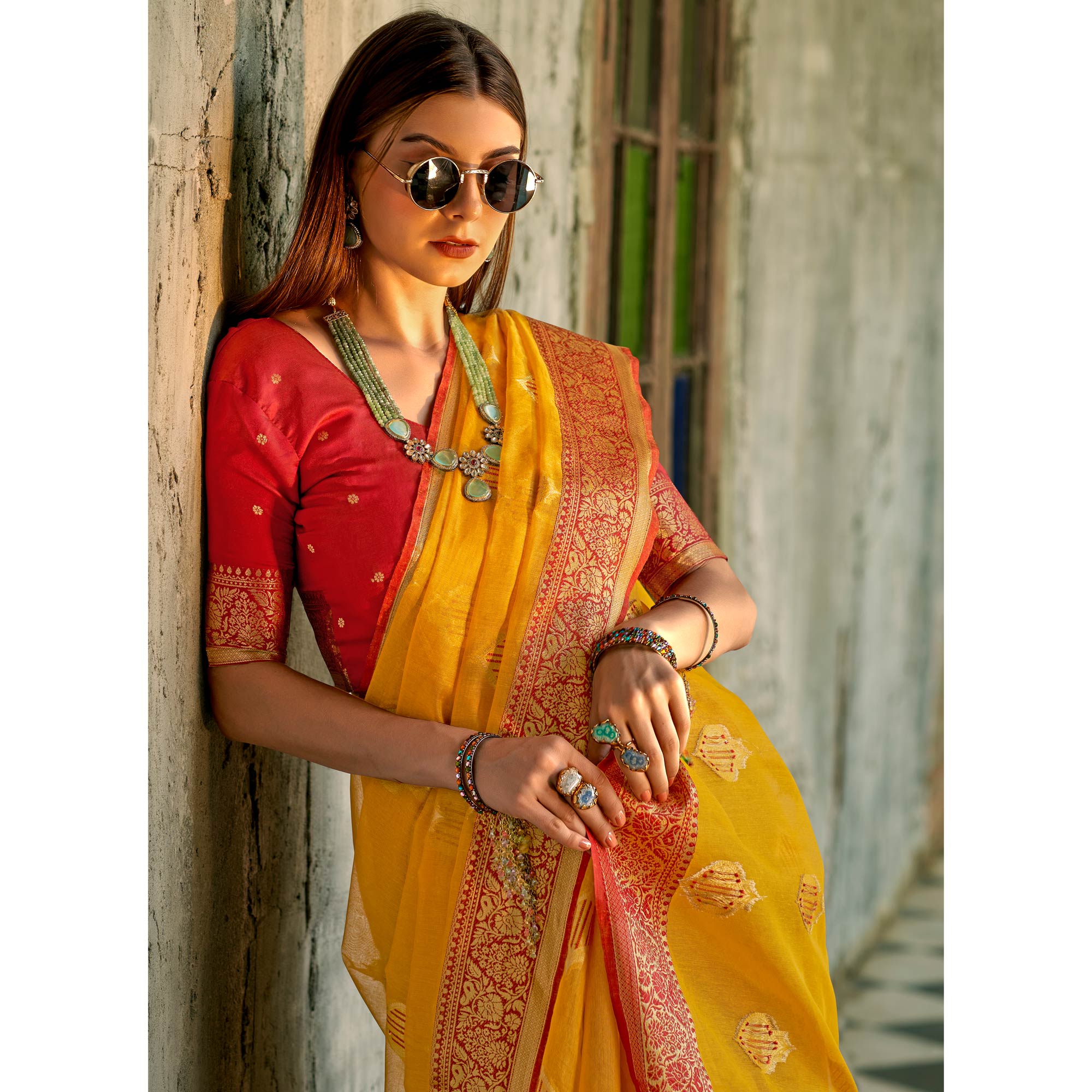 Yellow Floral Woven Tissue Silk Saree With Tassels