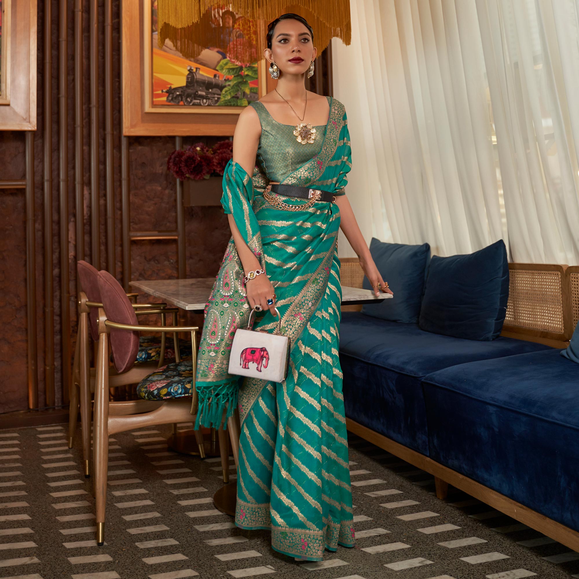 Rama Green Woven Organza Saree With Tassels