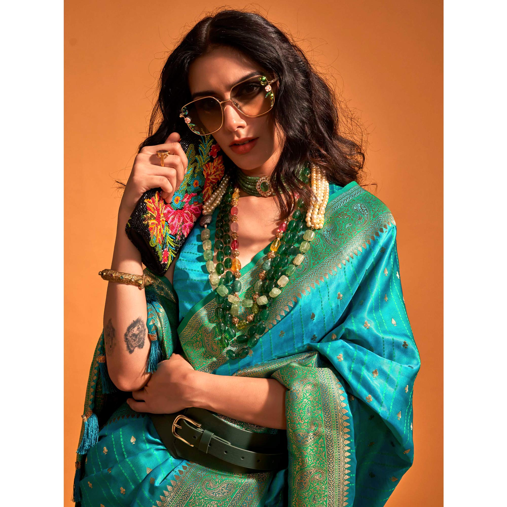 Rama Blue Woven Zari Border Satin Saree With Tassels