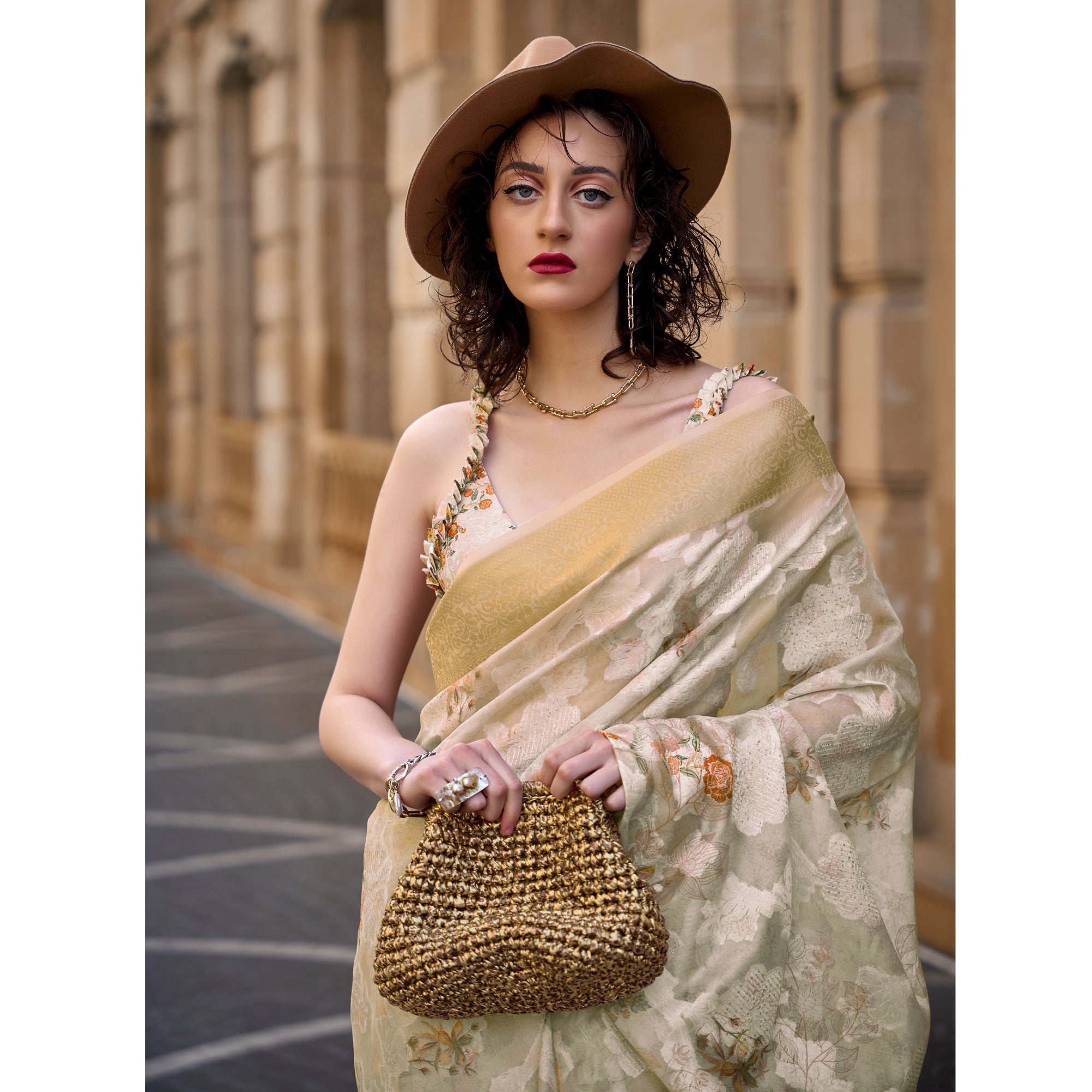 Beige Floral Woven Brasso Saree With Tassels