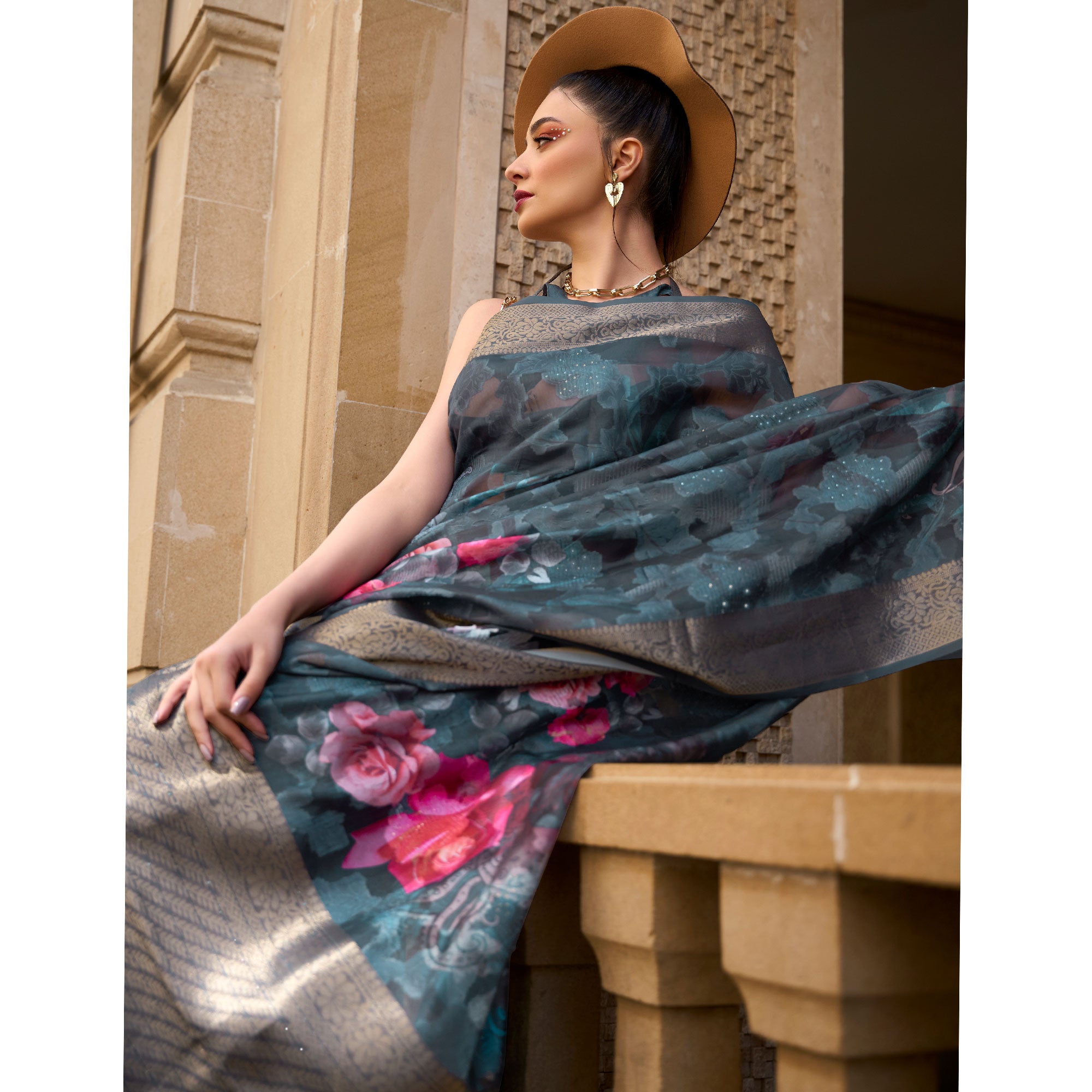 Teal Floral Woven Brasso Saree With Tassels