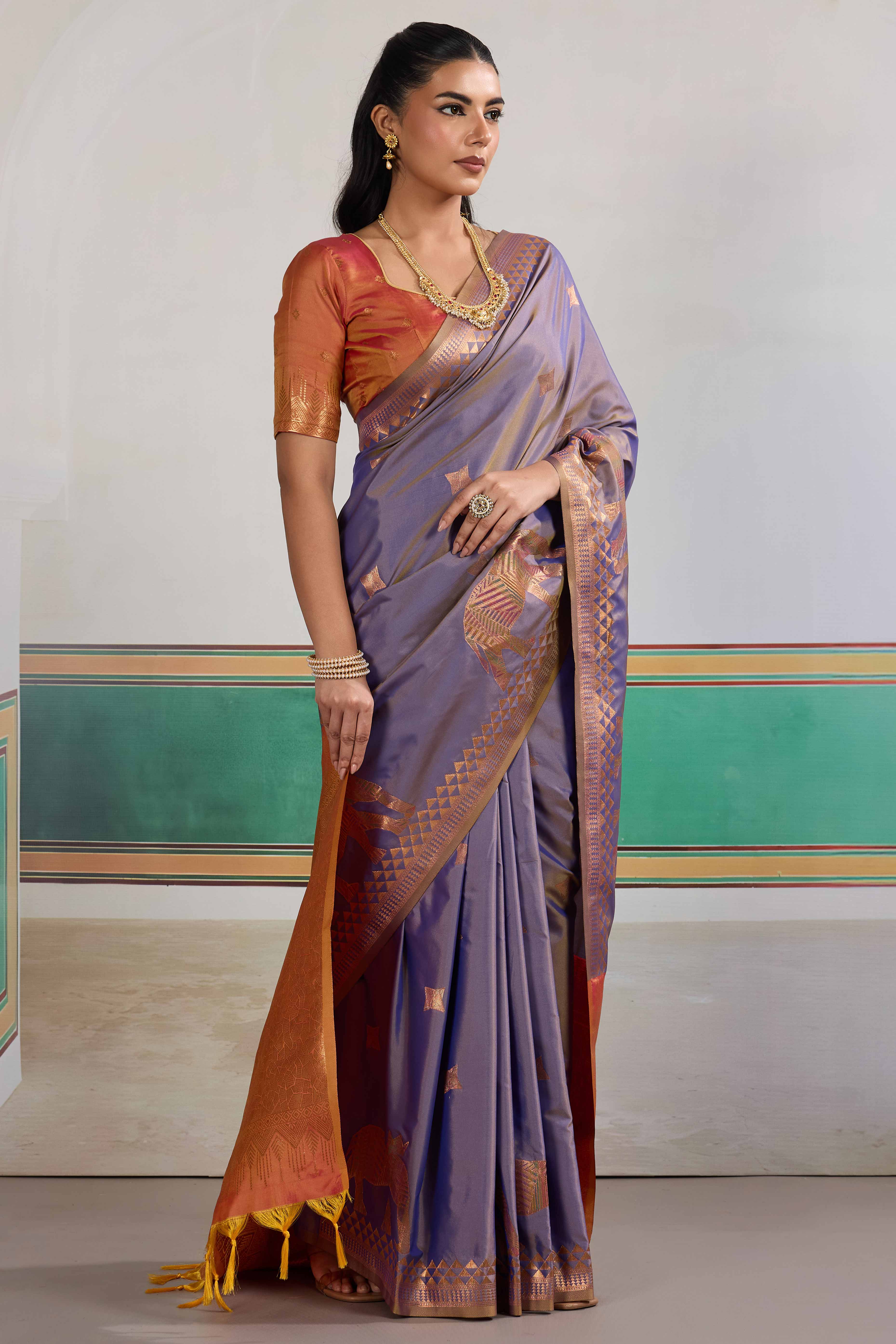 Traditional Lavender Pure Silk Saree Featuring Elephant Motif Zari Weaving & Tassel Pallu