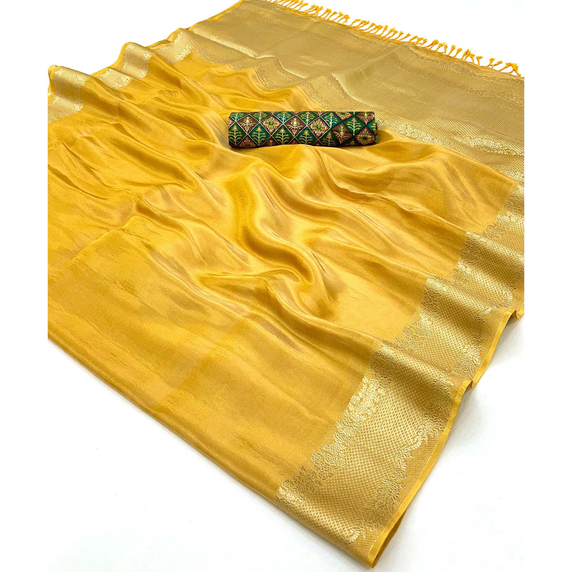 Yellow Tissue Saree Adorned with Zari Weaving Border