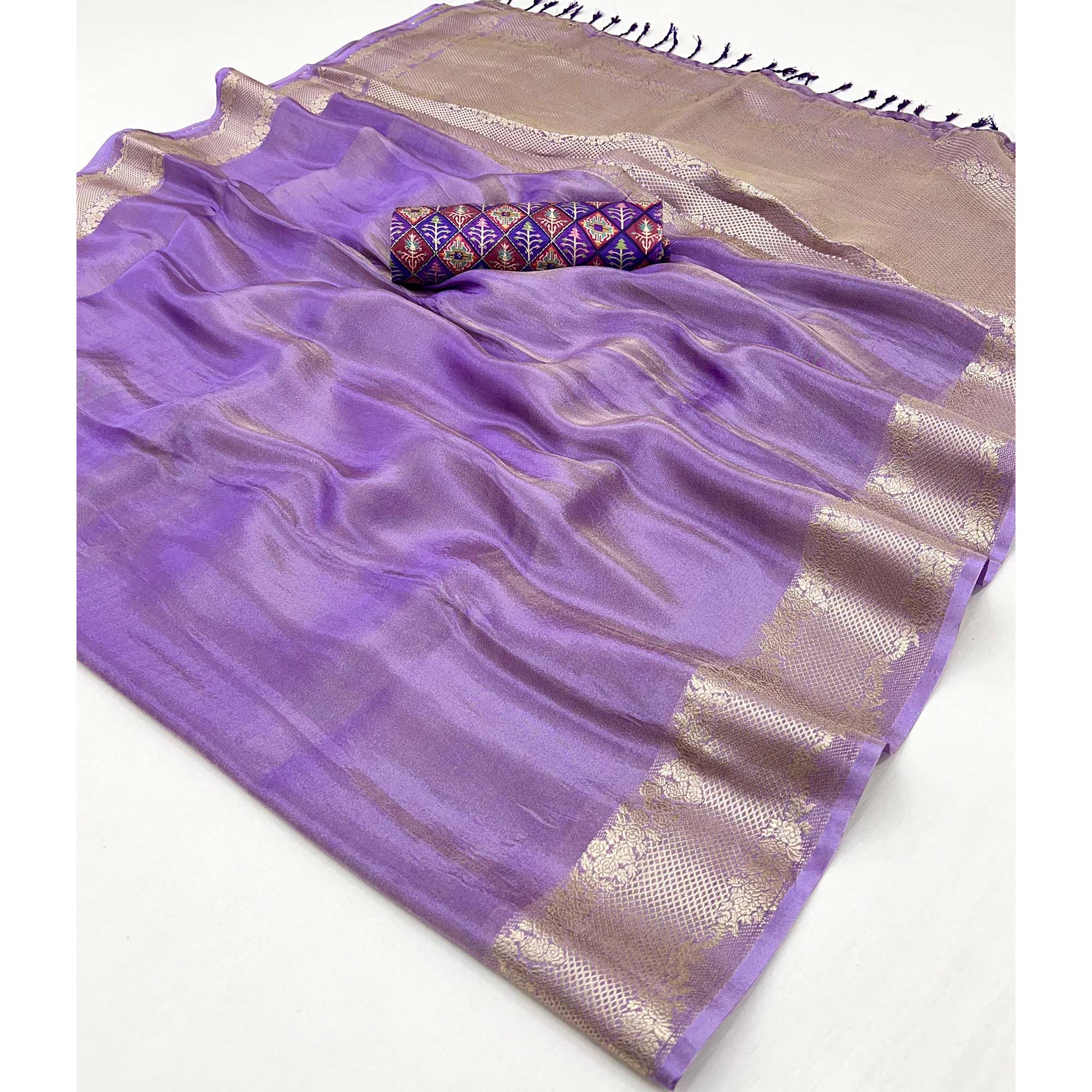 Purple Tissue Saree Adorned with Zari Weaving Border