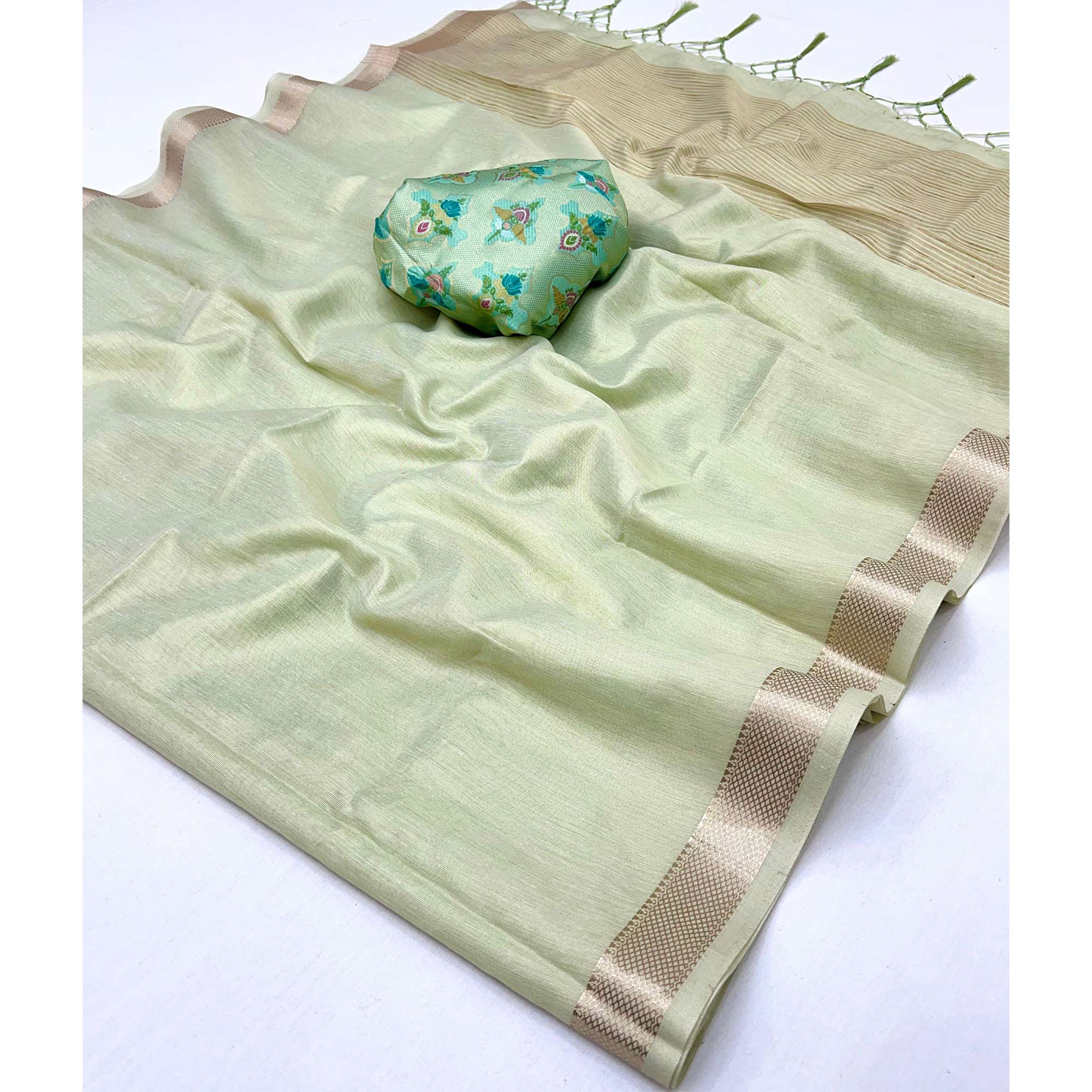 Delicate Sea Green Saree with Classic Zari Weaving on Tissue Fabric