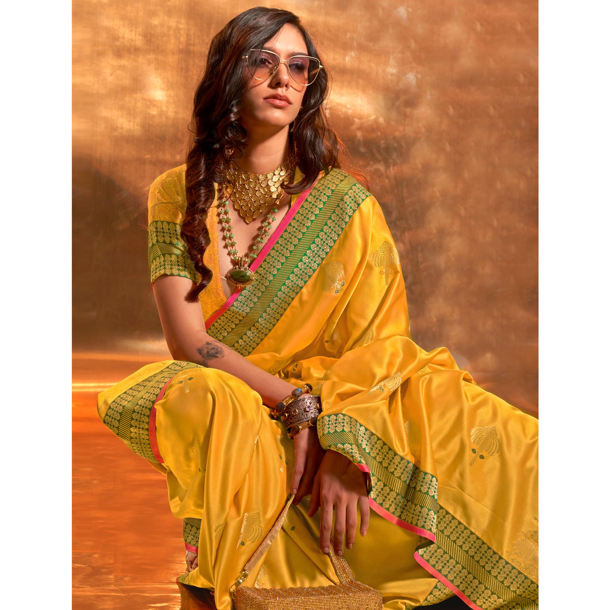 Yellow Woven Satin Saree With Tassels