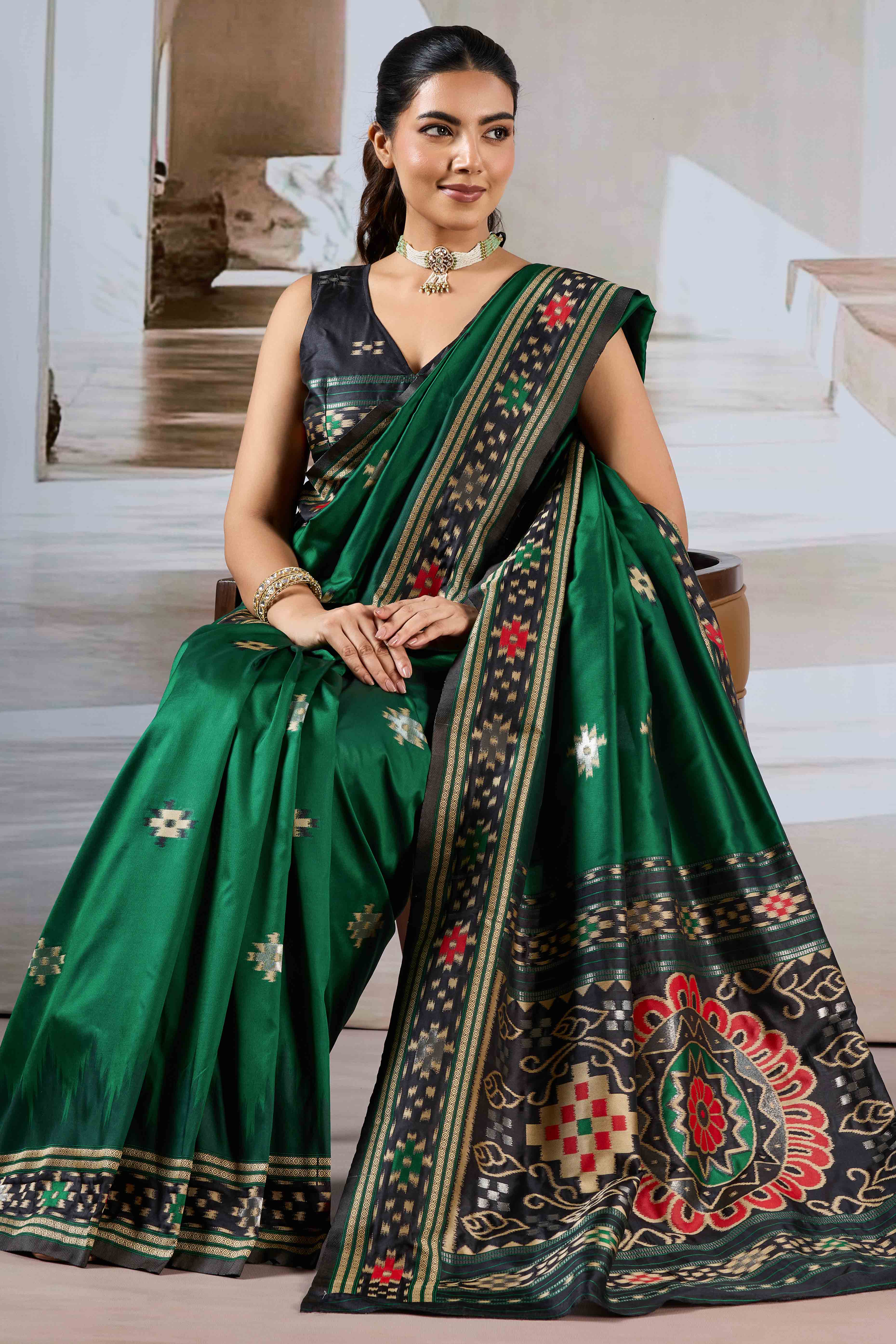 Green Art Silk Saree Adorned with Intricate Patola Style Woven Designs