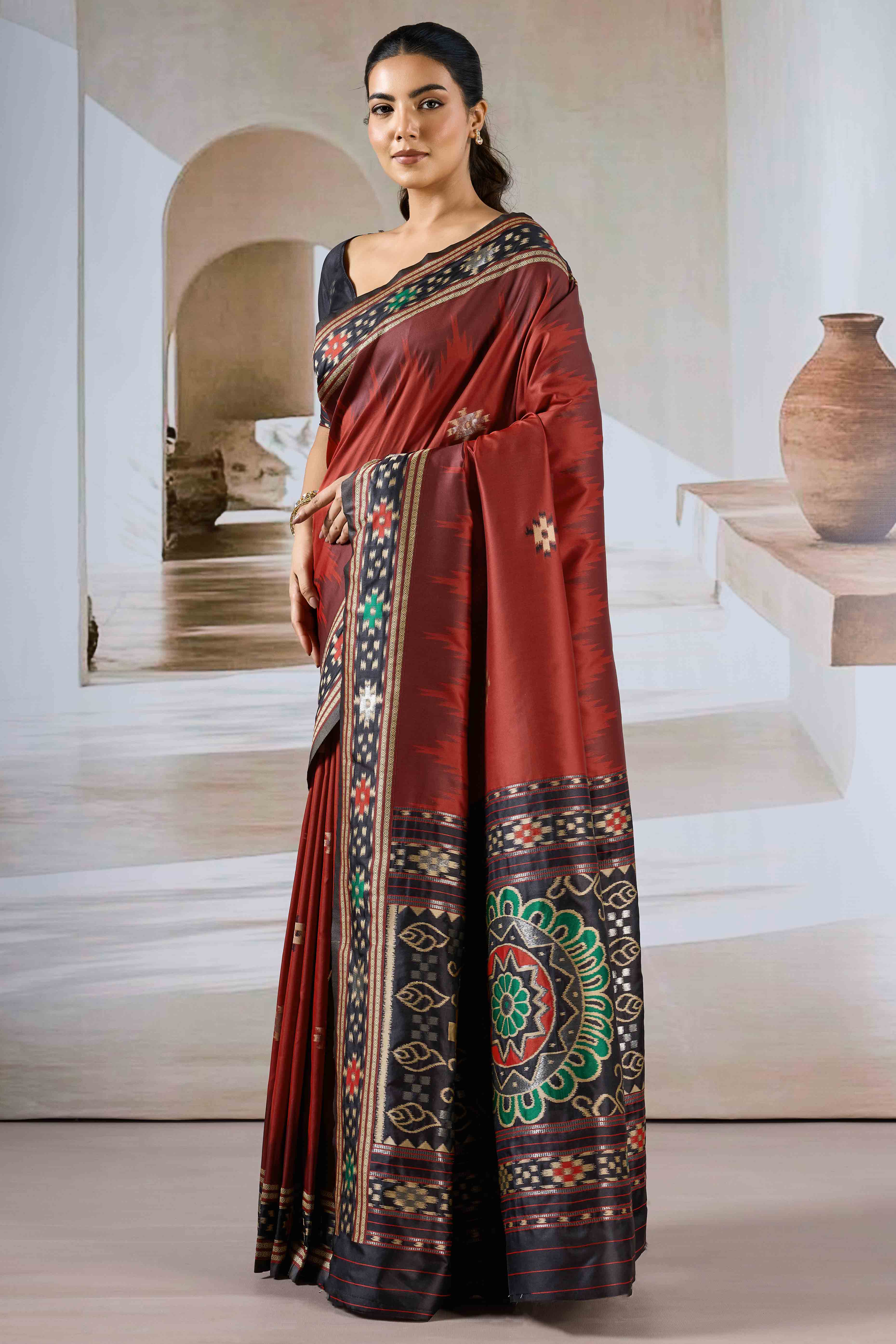 Maroon Art Silk Saree Adorned with Intricate Patola Style Woven Designs