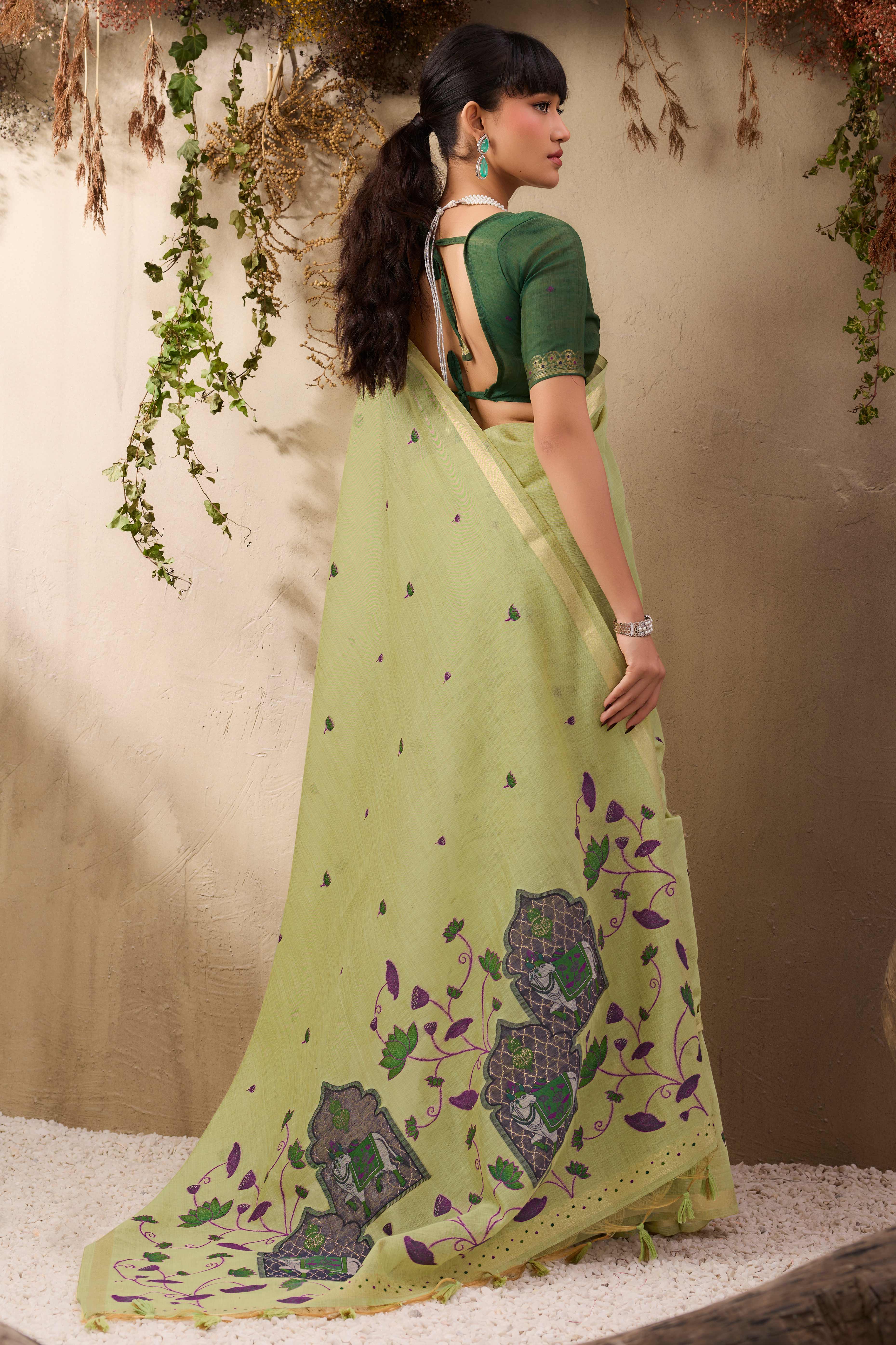 Green Lightweight Handloom Munga Cotton Blend Saree Accented with Floral Woven Motifs